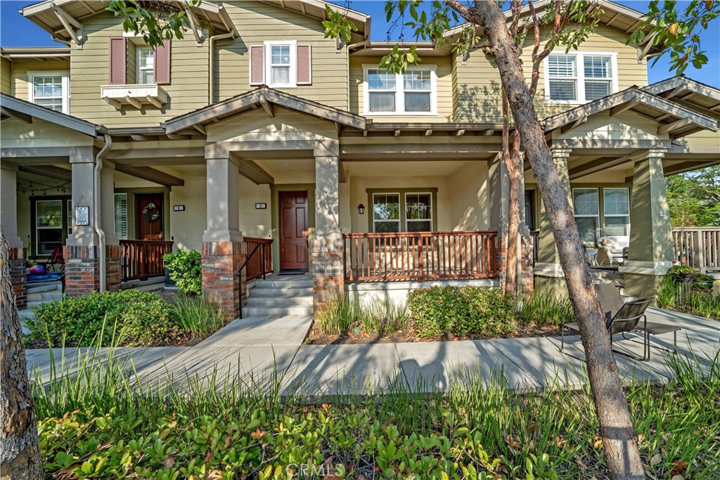 5 Arlington Street Ladera Ranch, CA 92694 - Photo 1 of 26 front view of a brick house with a small yard