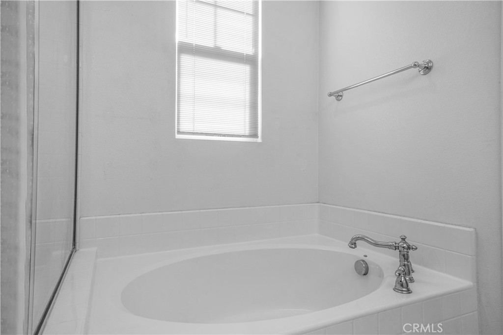 5 Arlington Street Ladera Ranch, CA 92694 - Photo 18 of 26 a white bath tub sitting next to a window
