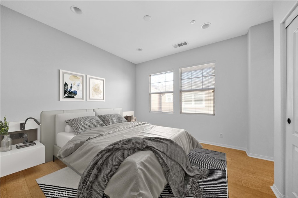 5 Arlington Street Ladera Ranch, CA 92694 - Photo 20 of 26 a bed sitting in a bedroom next to a window