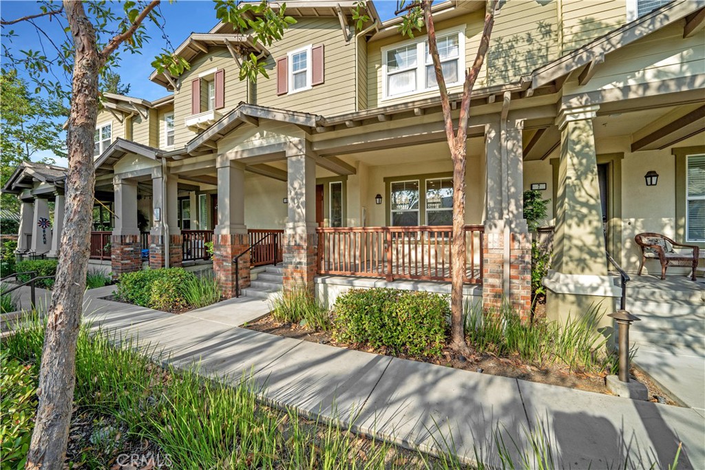 5 Arlington Street Ladera Ranch, CA 92694 - Photo 2 of 26 a view of a brick building next to a yard