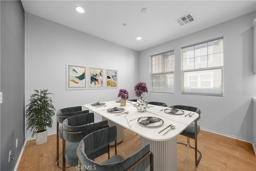 5 Arlington Street Ladera Ranch, CA 92694 - Photo 7 of 26 a view of a dining room with furniture window and wooden floor