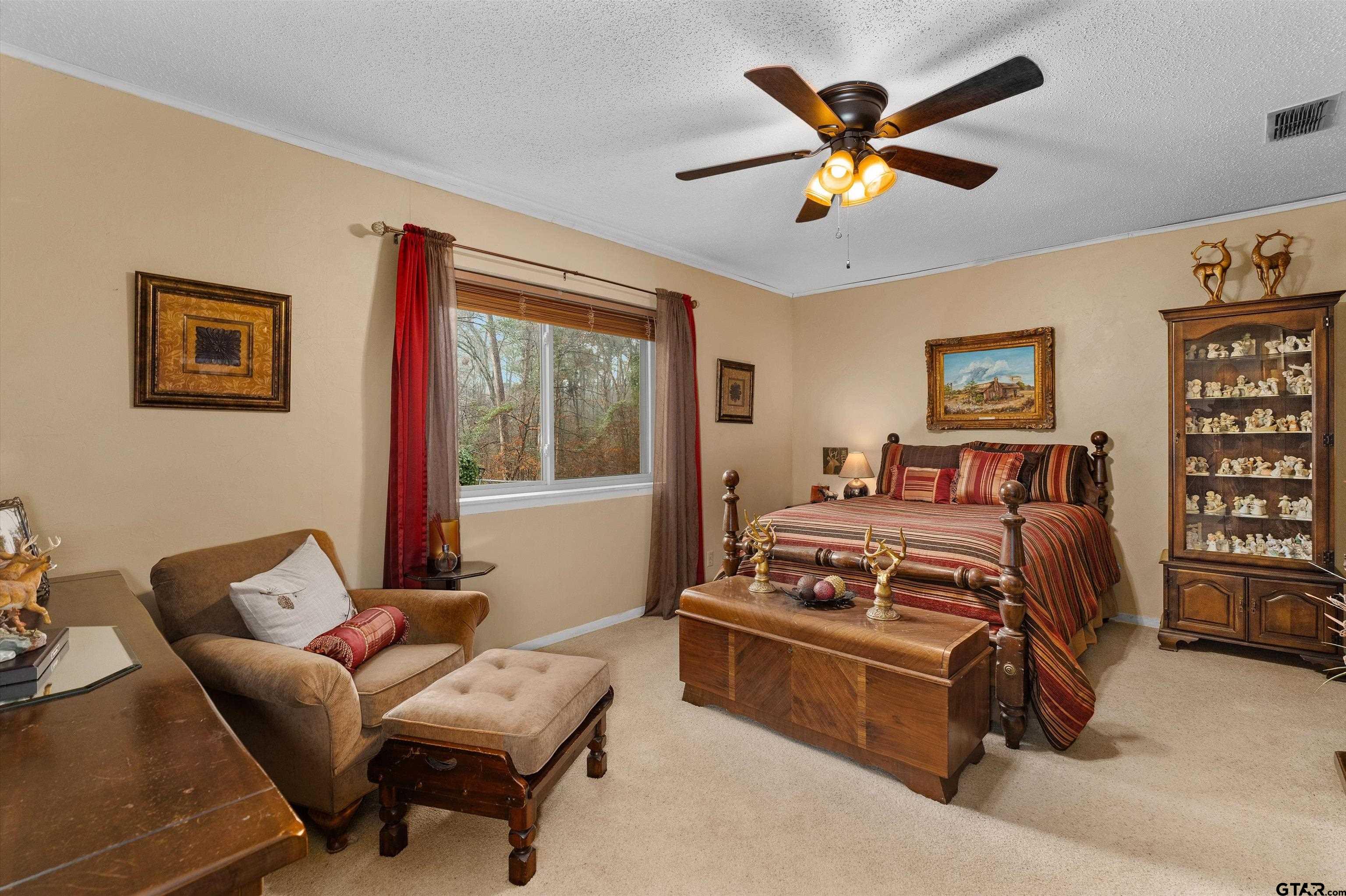 3501 Boyd Road Longview, TX 75604 - Photo 14 of 39 a living room with furniture and large windows