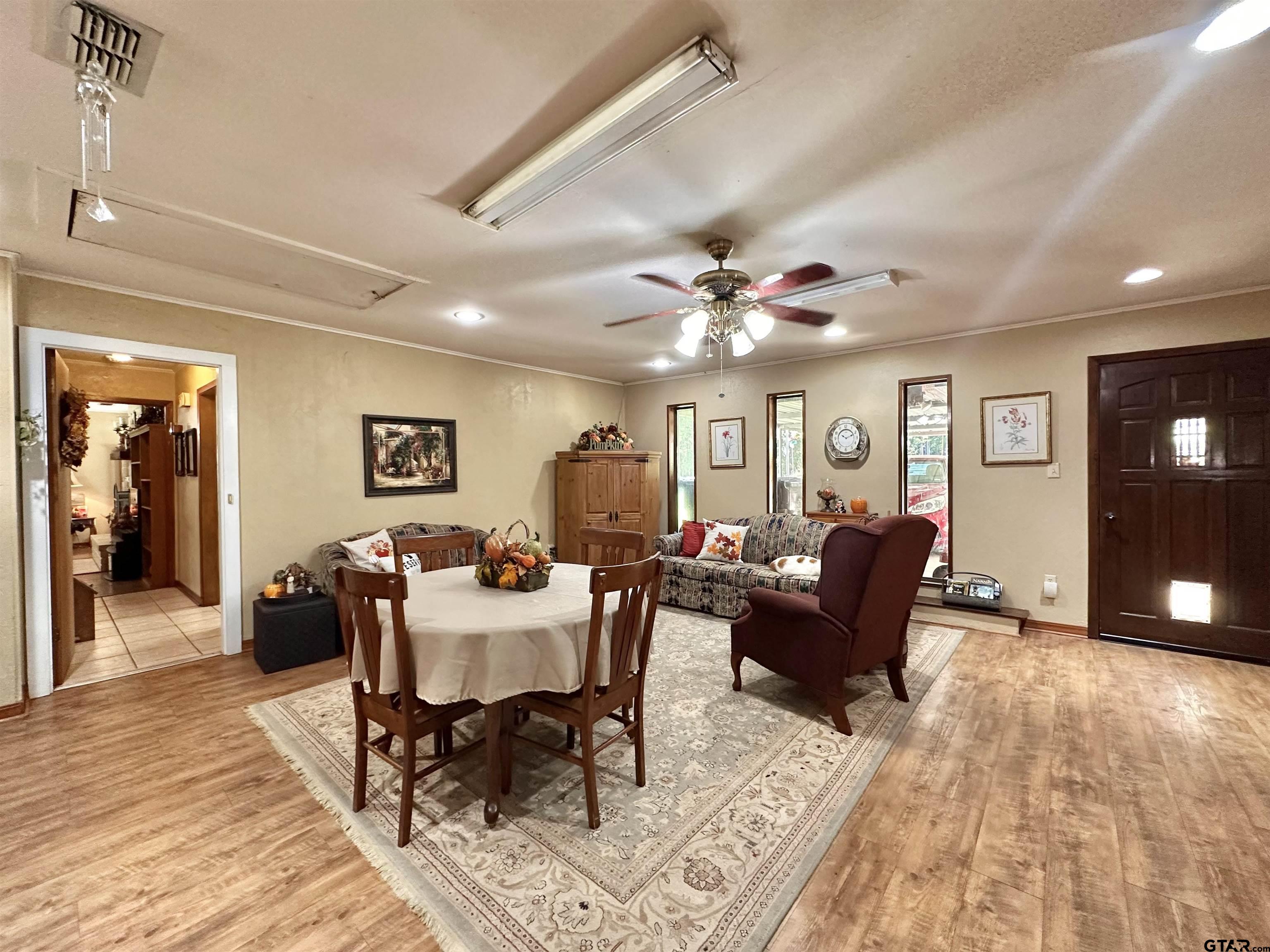 3501 Boyd Road Longview, TX 75604 - Photo 16 of 40 a living room with furniture and wooden floor