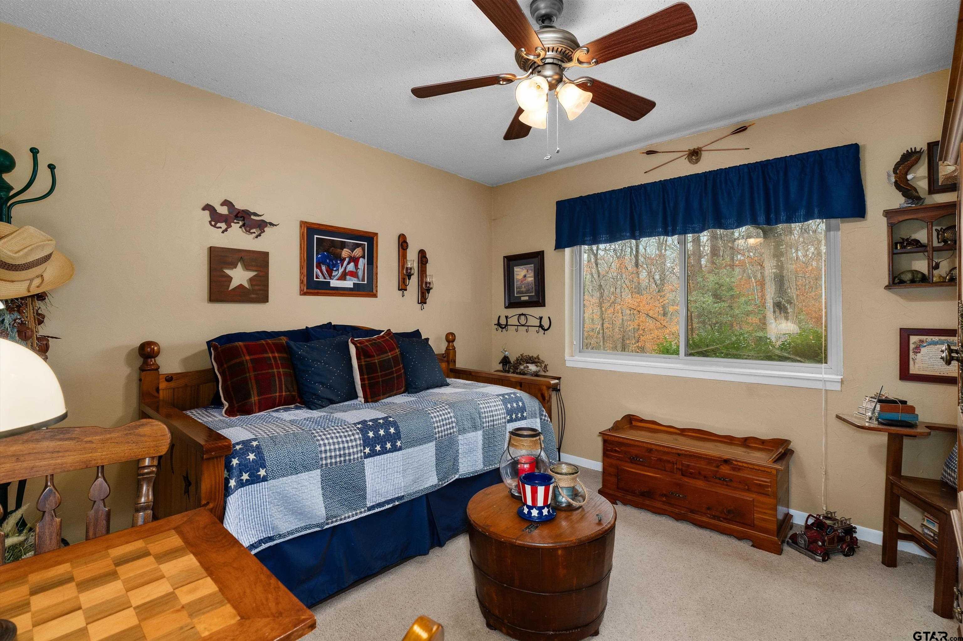 3501 Boyd Road Longview, TX 75604 - Photo 20 of 39 a living room with furniture and a large window