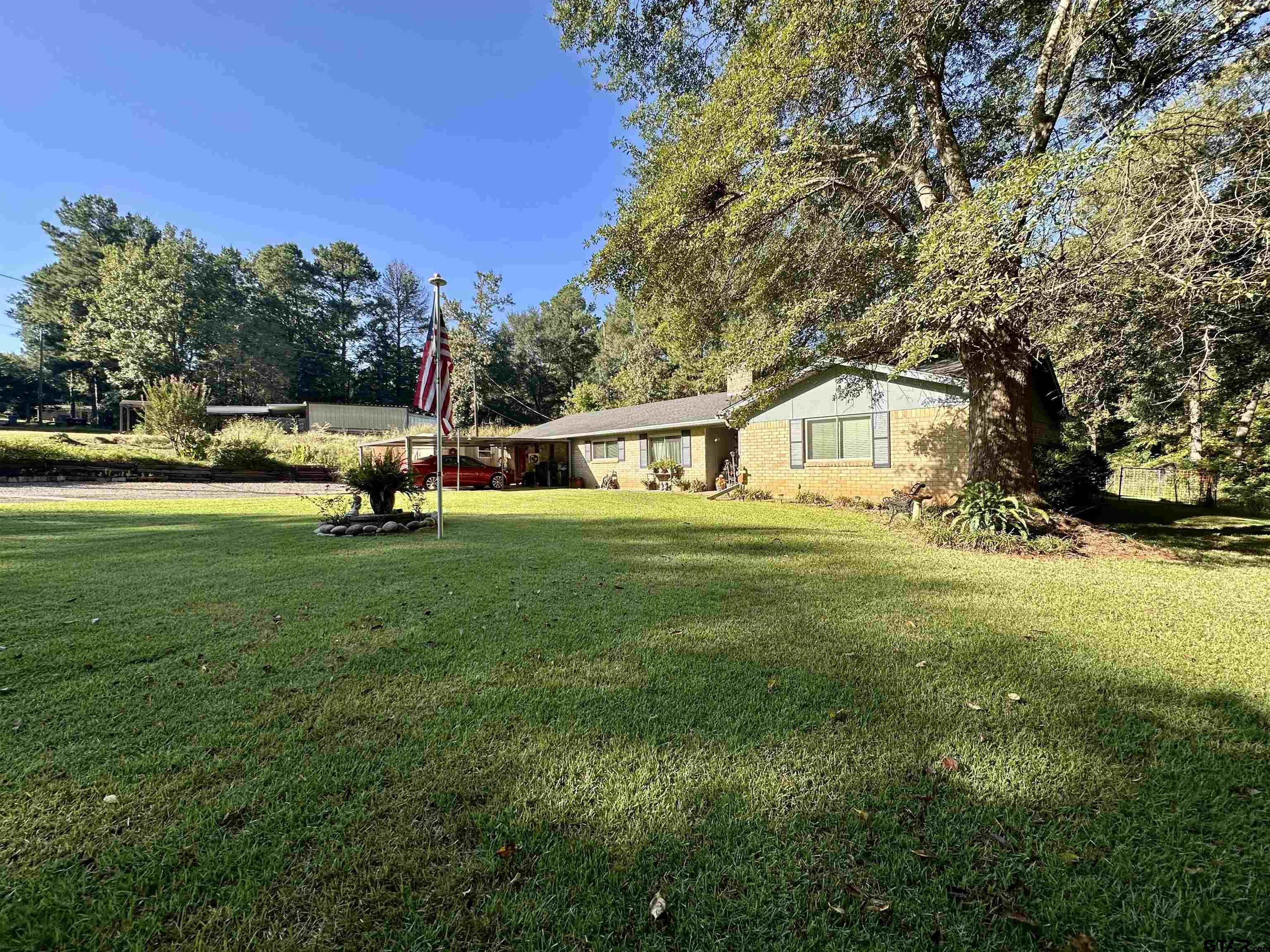 3501 Boyd Road Longview, TX 75604 - Photo 2 of 40 a view of house with outdoor space