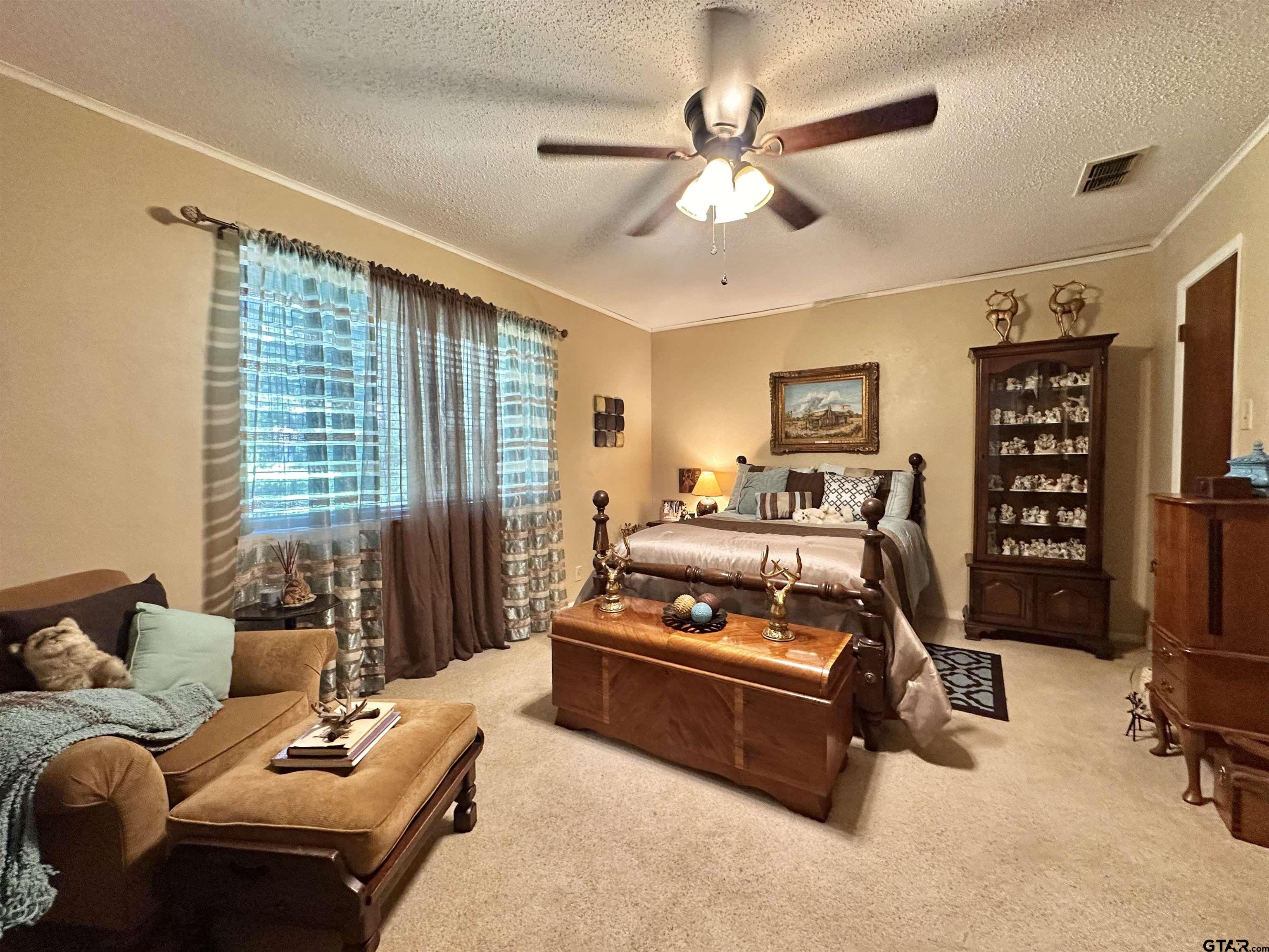 3501 Boyd Road Longview, TX 75604 - Photo 23 of 40 a bedroom with furniture and a window