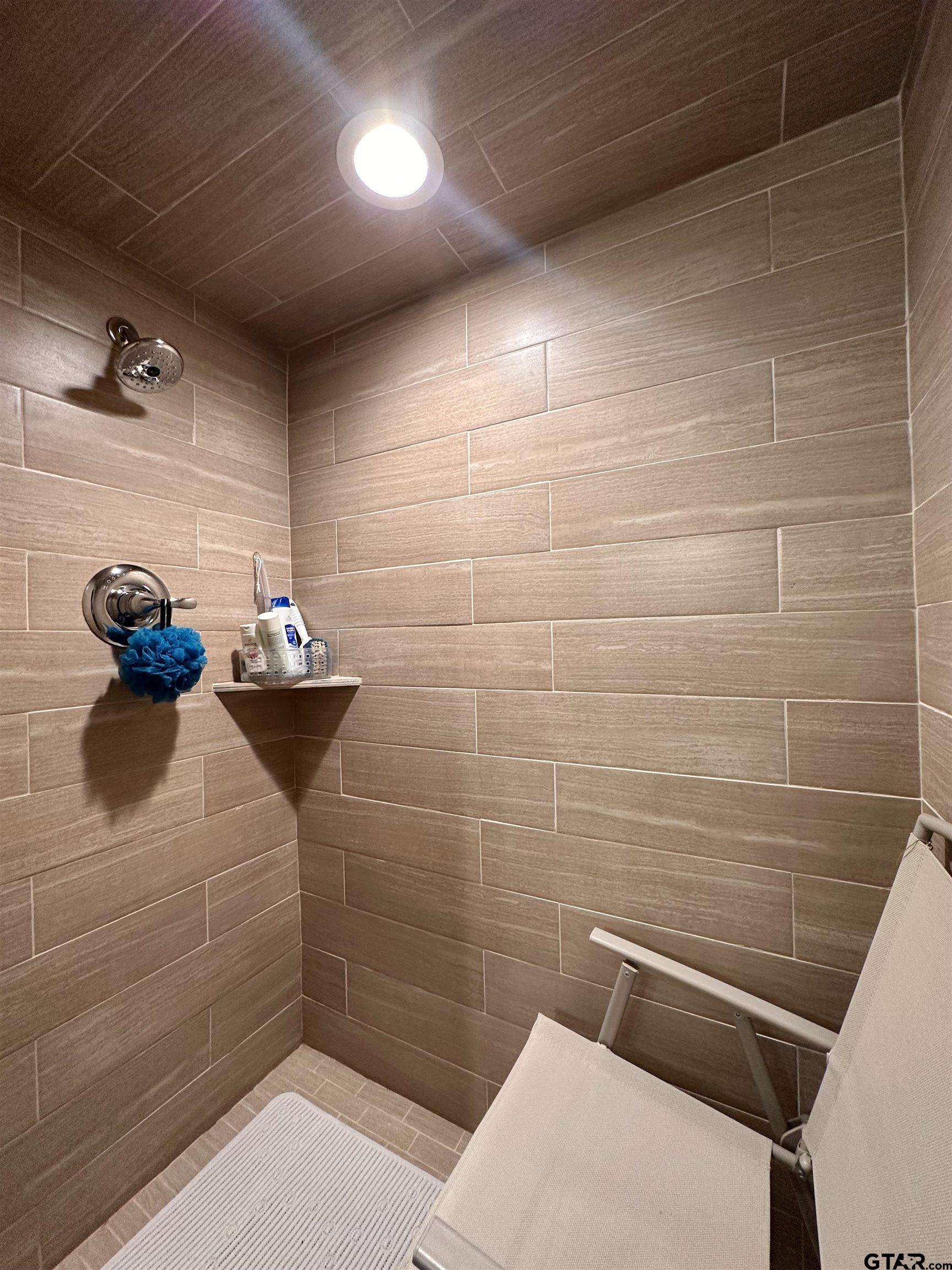 3501 Boyd Road Longview, TX 75604 - Photo 26 of 40 a bathroom with a sink and a mirror