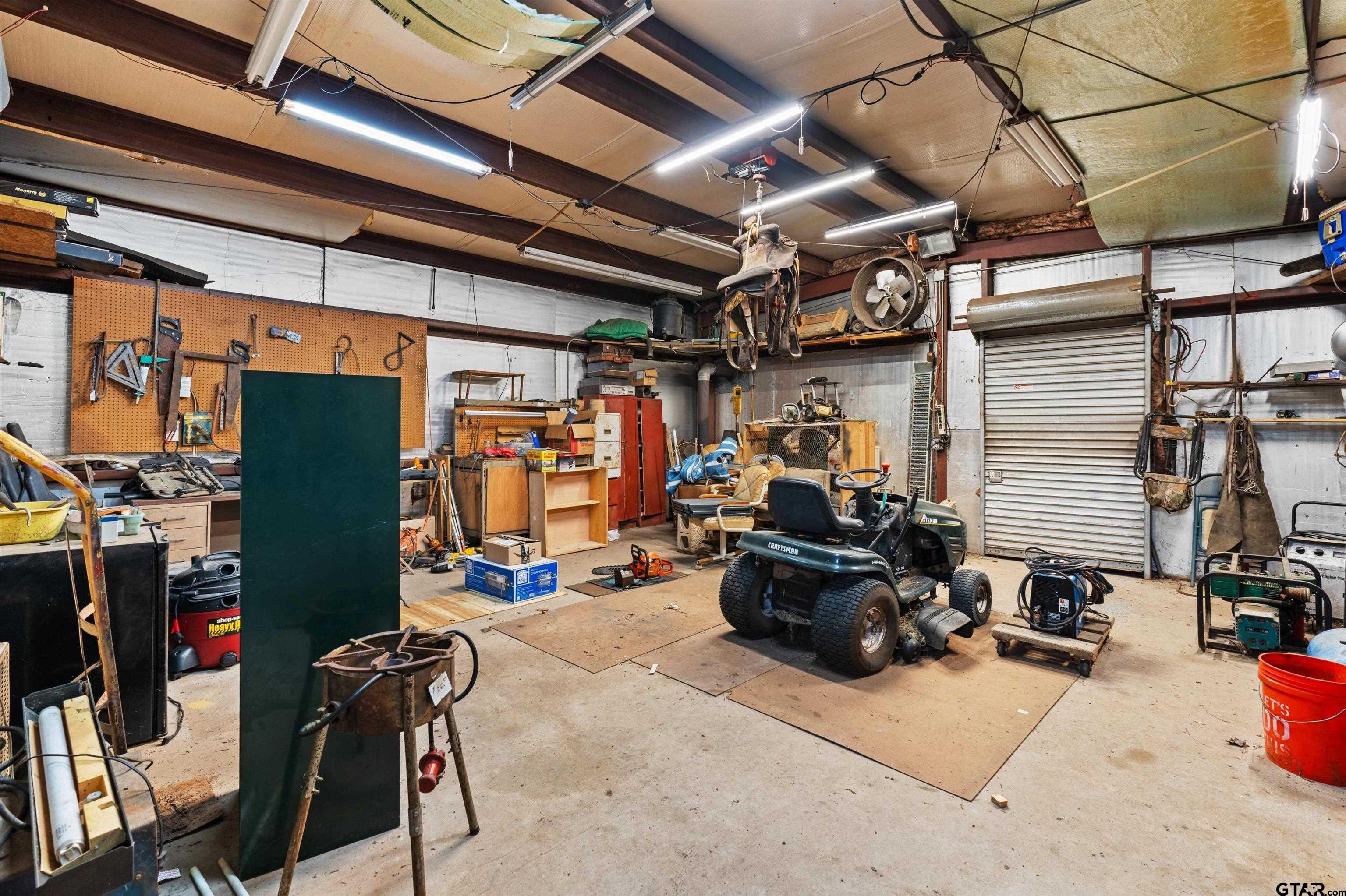 3501 Boyd Road Longview, TX 75604 - Photo 29 of 39 a view of a storage room with a lot of stuff