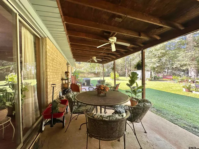 a outdoor space with furniture and garden view