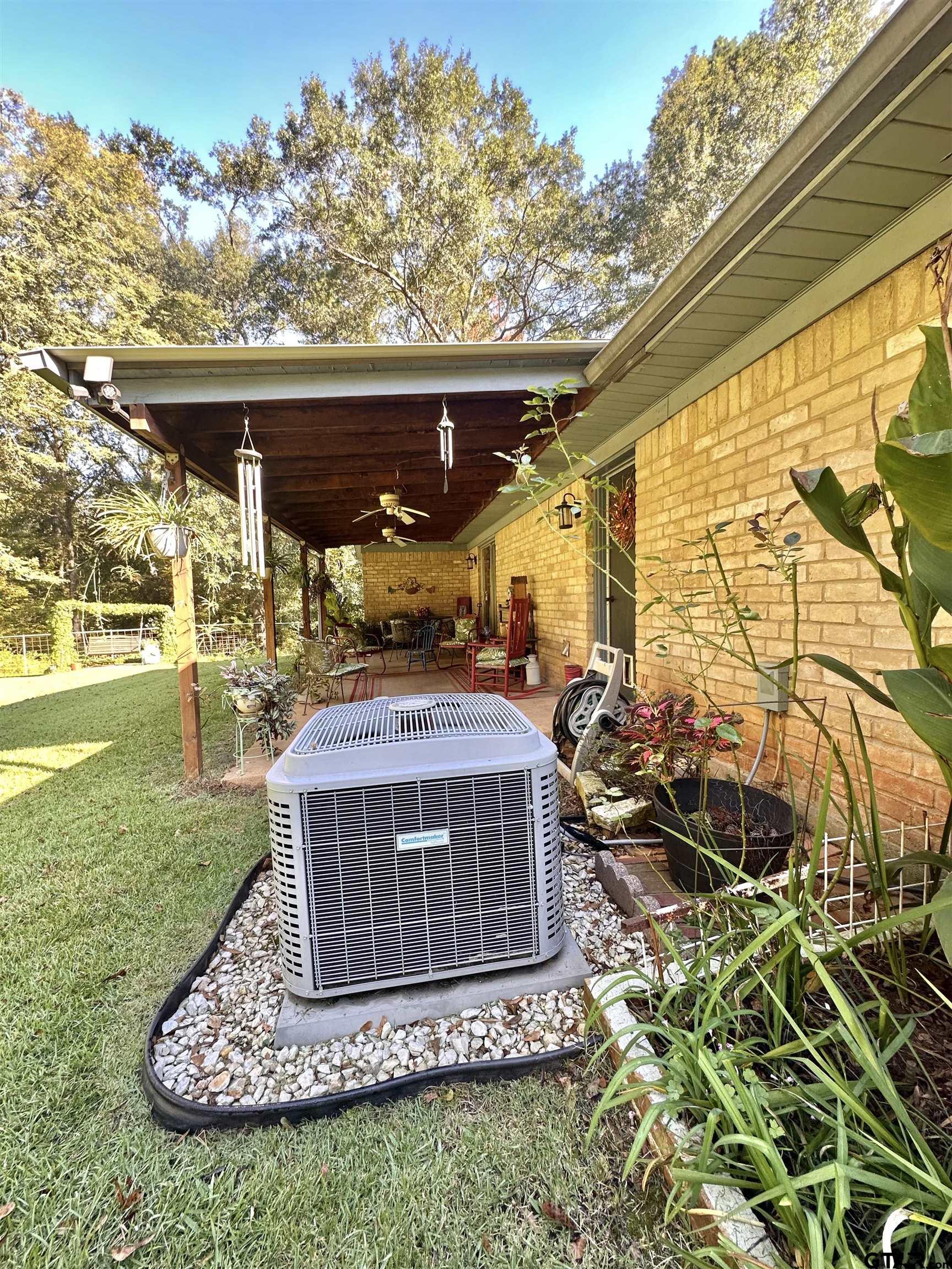 3501 Boyd Road Longview, TX 75604 - Photo 36 of 40 a view of a porch with a yard