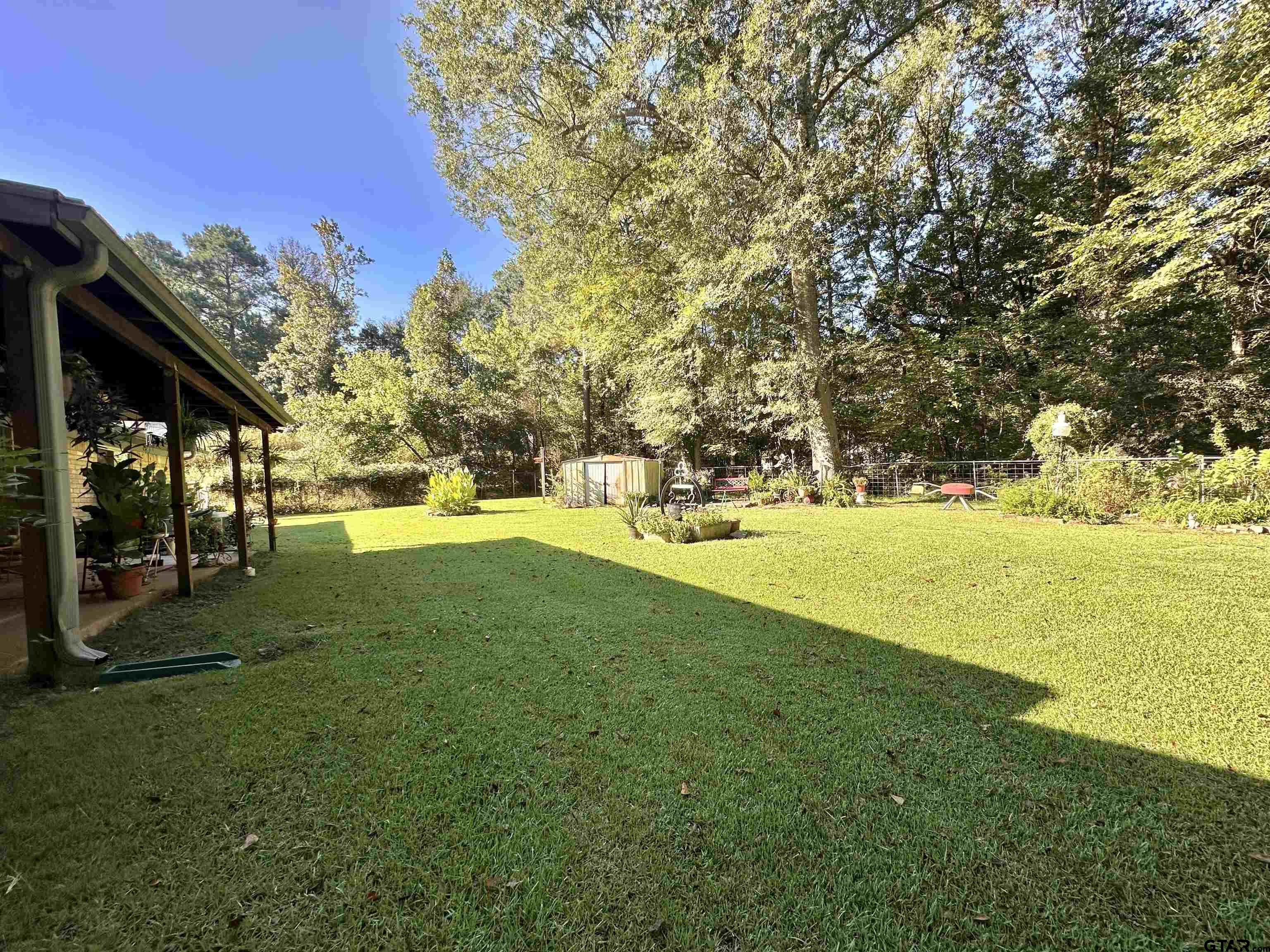 3501 Boyd Road Longview, TX 75604 - Photo 37 of 40 a view of yard with swimming pool