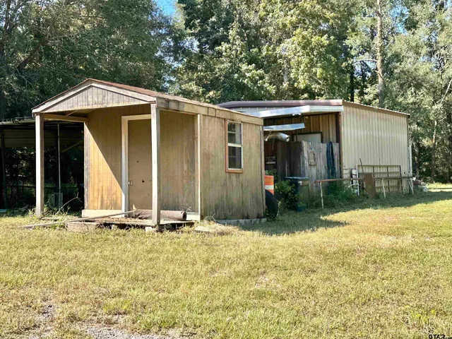 a front view of house with yard