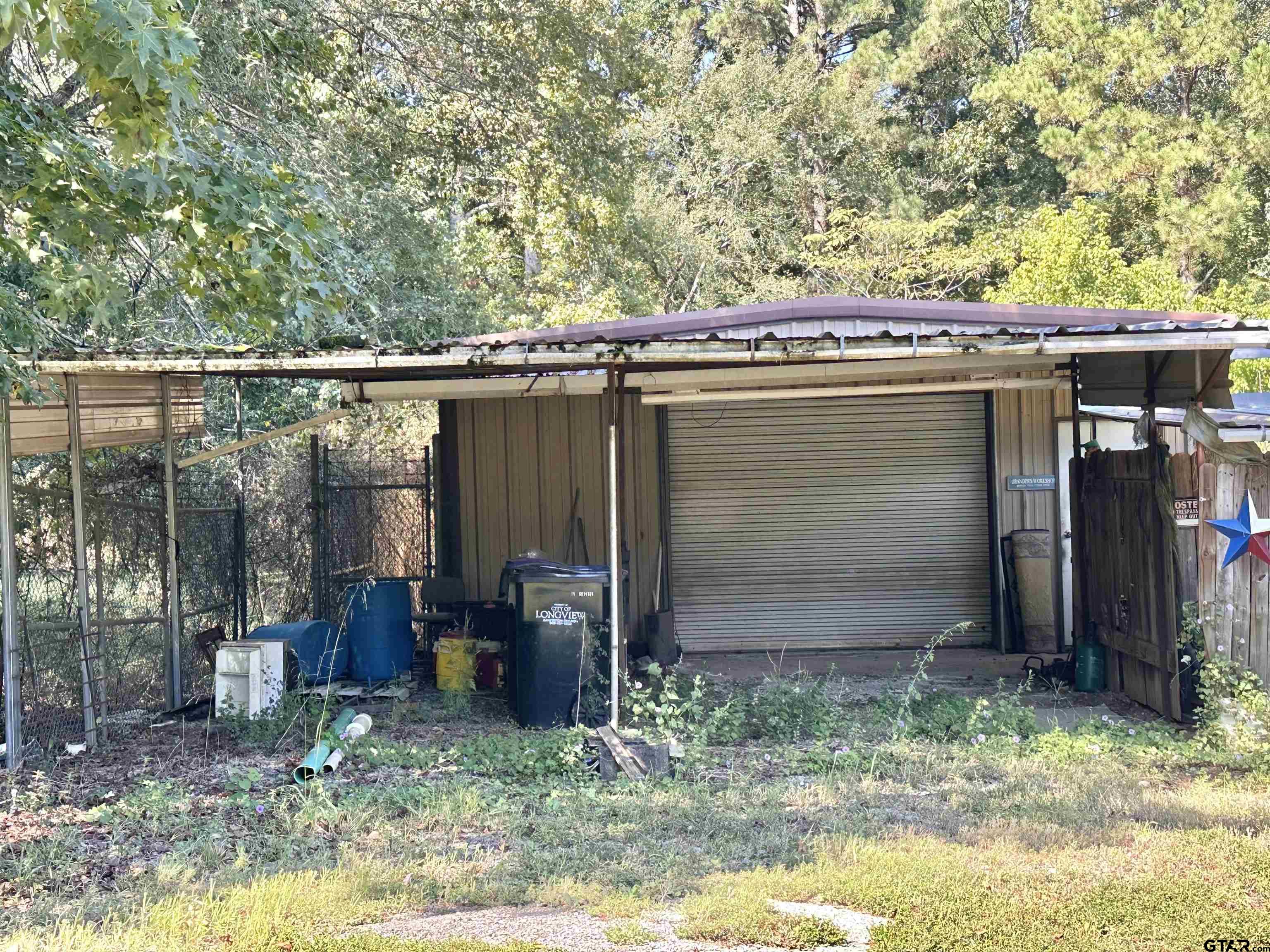 3501 Boyd Road Longview, TX 75604 - Photo 40 of 40 a backyard of a house with barbeque oven