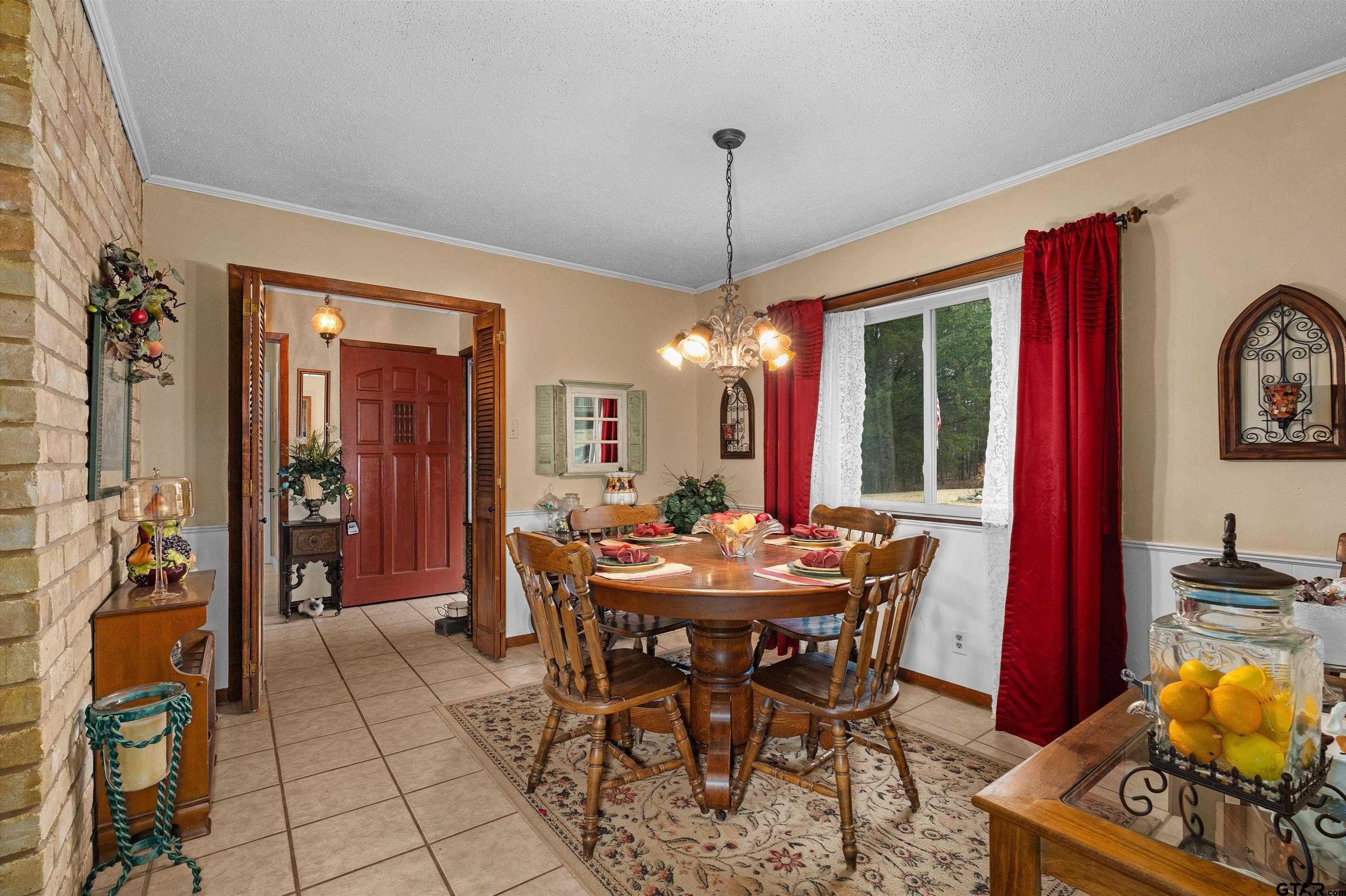 3501 Boyd Road Longview, TX 75604 - Photo 6 of 39 a view of a dining room with furniture window and wooden floor