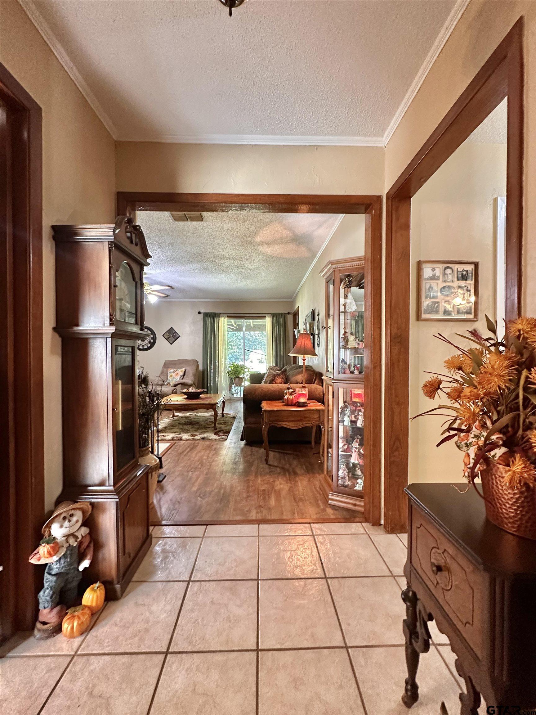 3501 Boyd Road Longview, TX 75604 - Photo 6 of 40 a hallway with a car parked in it