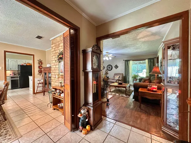a view of a livingroom with furniture and windows