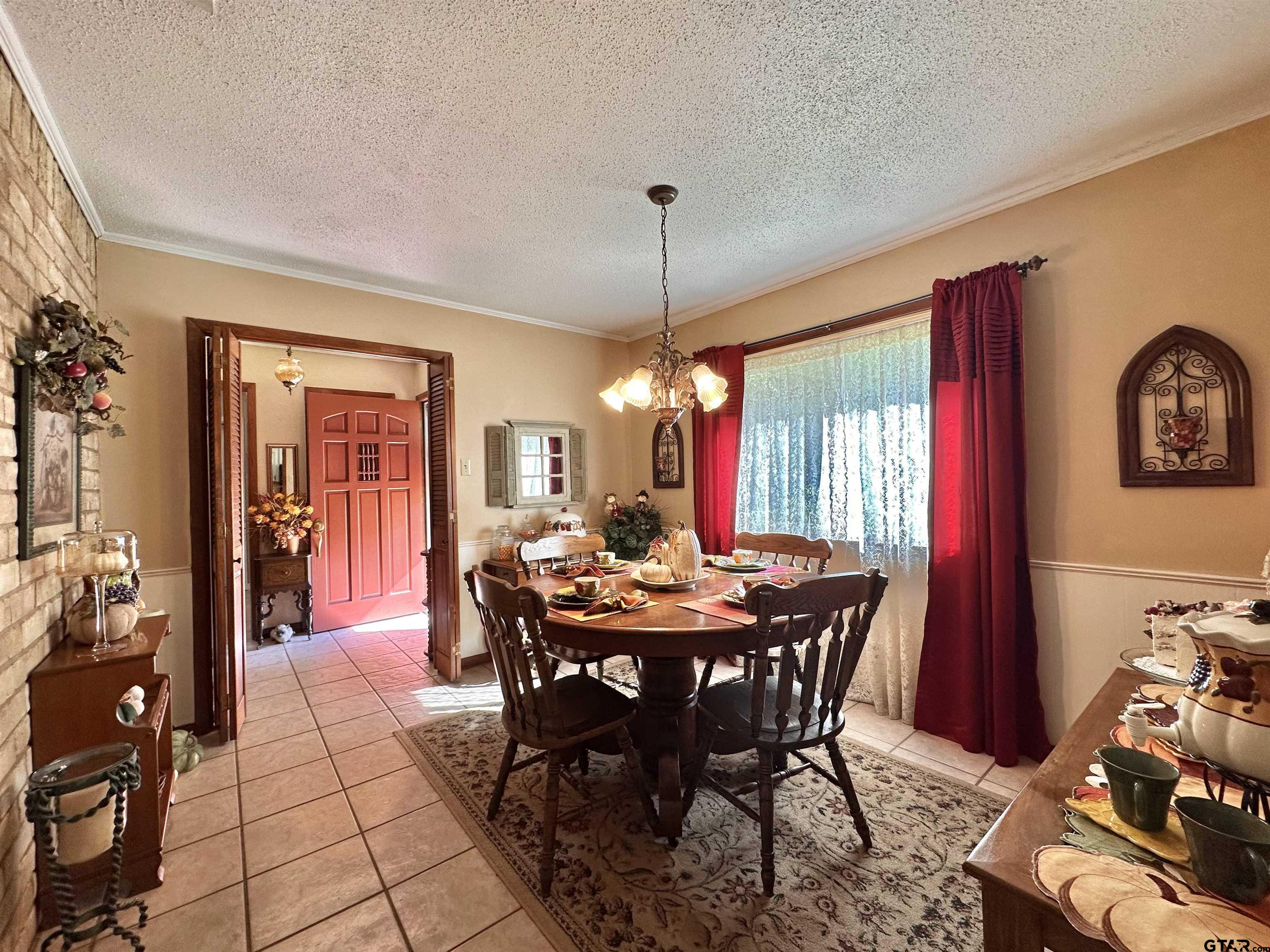 3501 Boyd Road Longview, TX 75604 - Photo 9 of 40 a view of a dining room with furniture and window