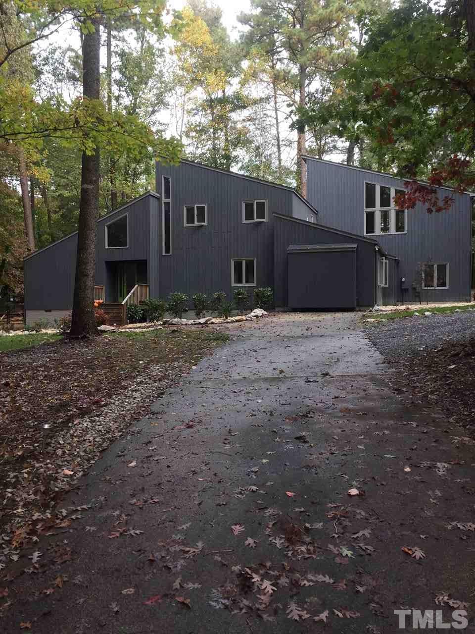 5400 Sylvan Lane Raleigh, NC 27613 - Photo 1 of 24 a backyard of a house with shaded area