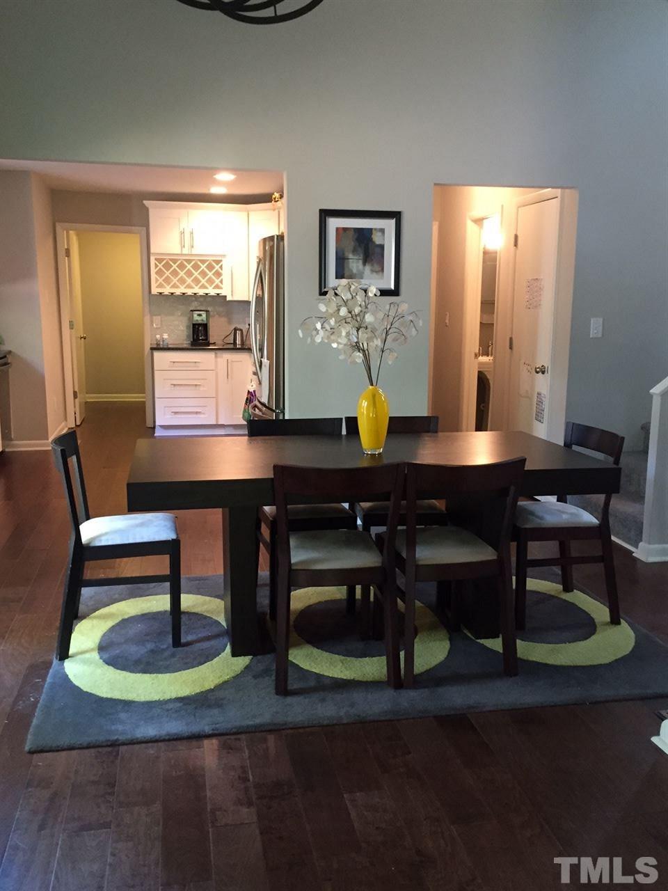 5400 Sylvan Lane Raleigh, NC 27613 - Photo 20 of 24 a view of a dining room with furniture