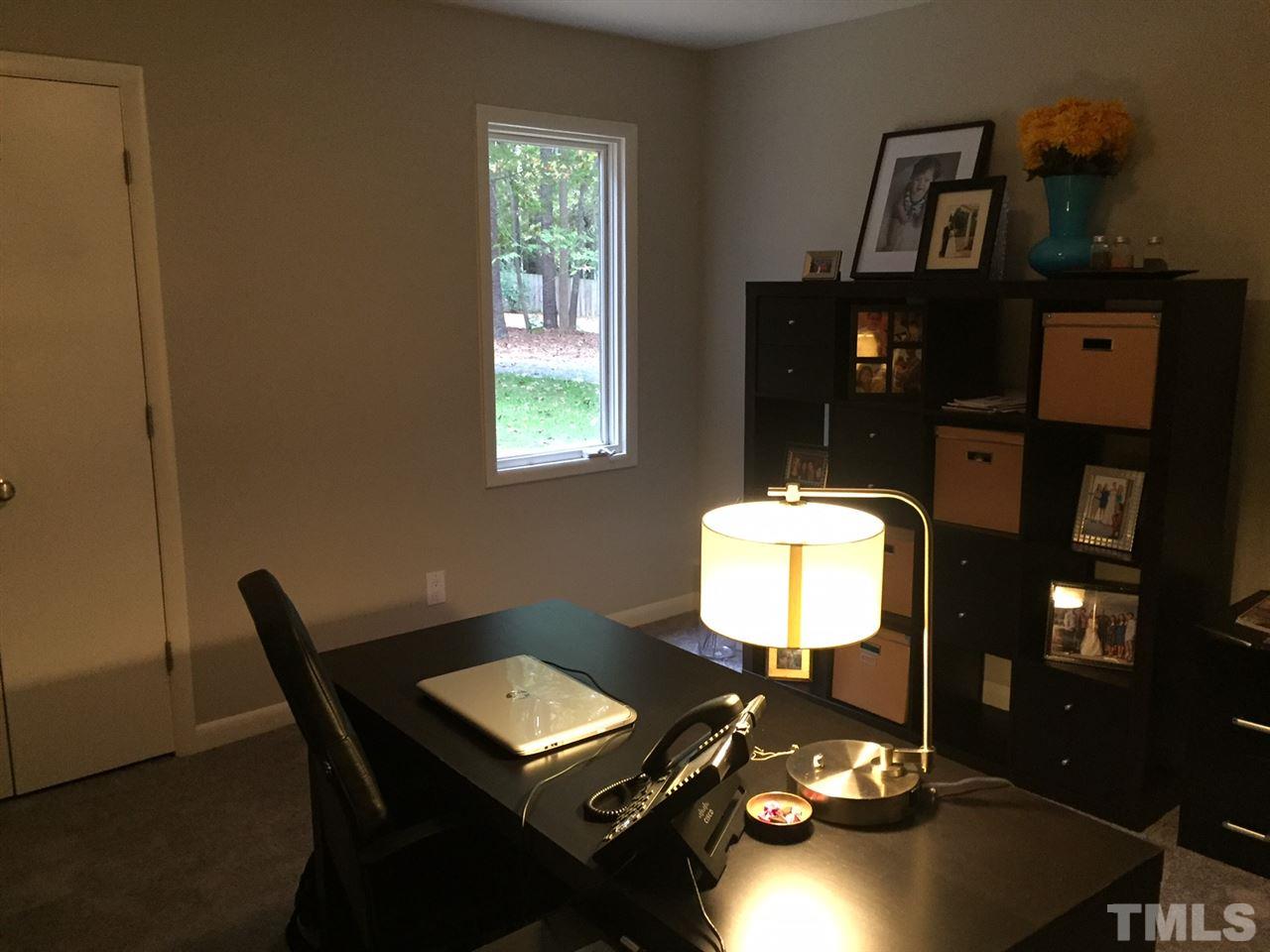5400 Sylvan Lane Raleigh, NC 27613 - Photo 3 of 24 a view of a workspace with furniture