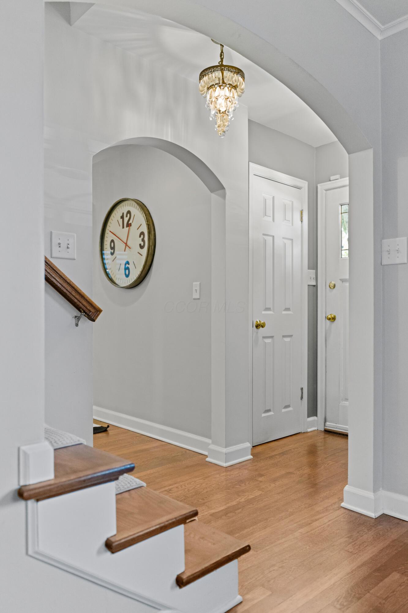 41 Aldrich Road Columbus, OH 43214 - Photo 8 of 52 Entry into Foyer with coat closet and mail slot, with views of the double archways and staircase