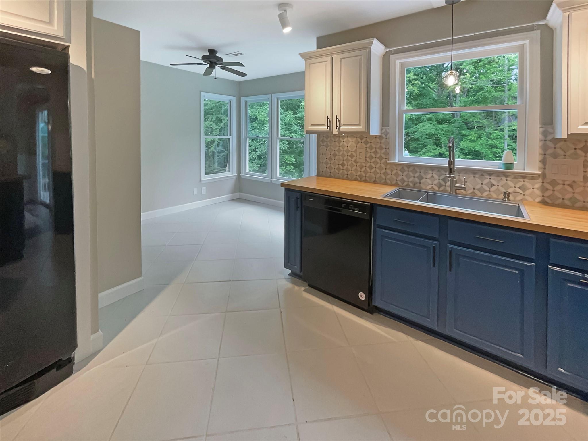 12092 Spinnaker Drive Fort Mill, SC 29708 - Photo 12 of 20 a kitchen with granite countertop a sink and a window