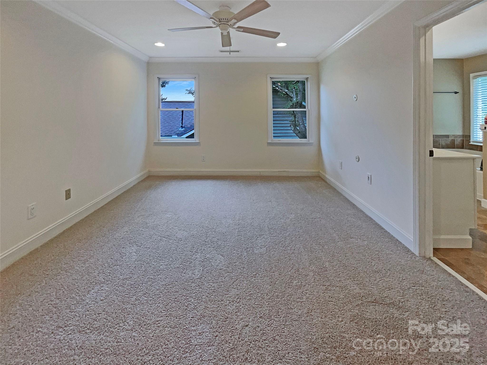 12092 Spinnaker Drive Fort Mill, SC 29708 - Photo 15 of 20 an empty room with a empty space and windows