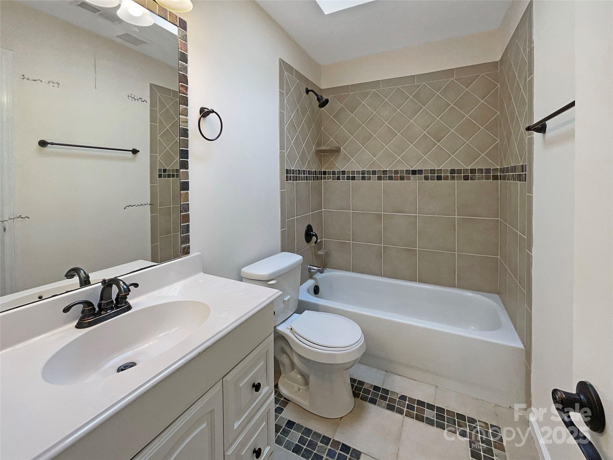 12092 Spinnaker Drive Fort Mill, SC 29708 - Photo 18 of 20 a bathroom with a sink toilet and shower