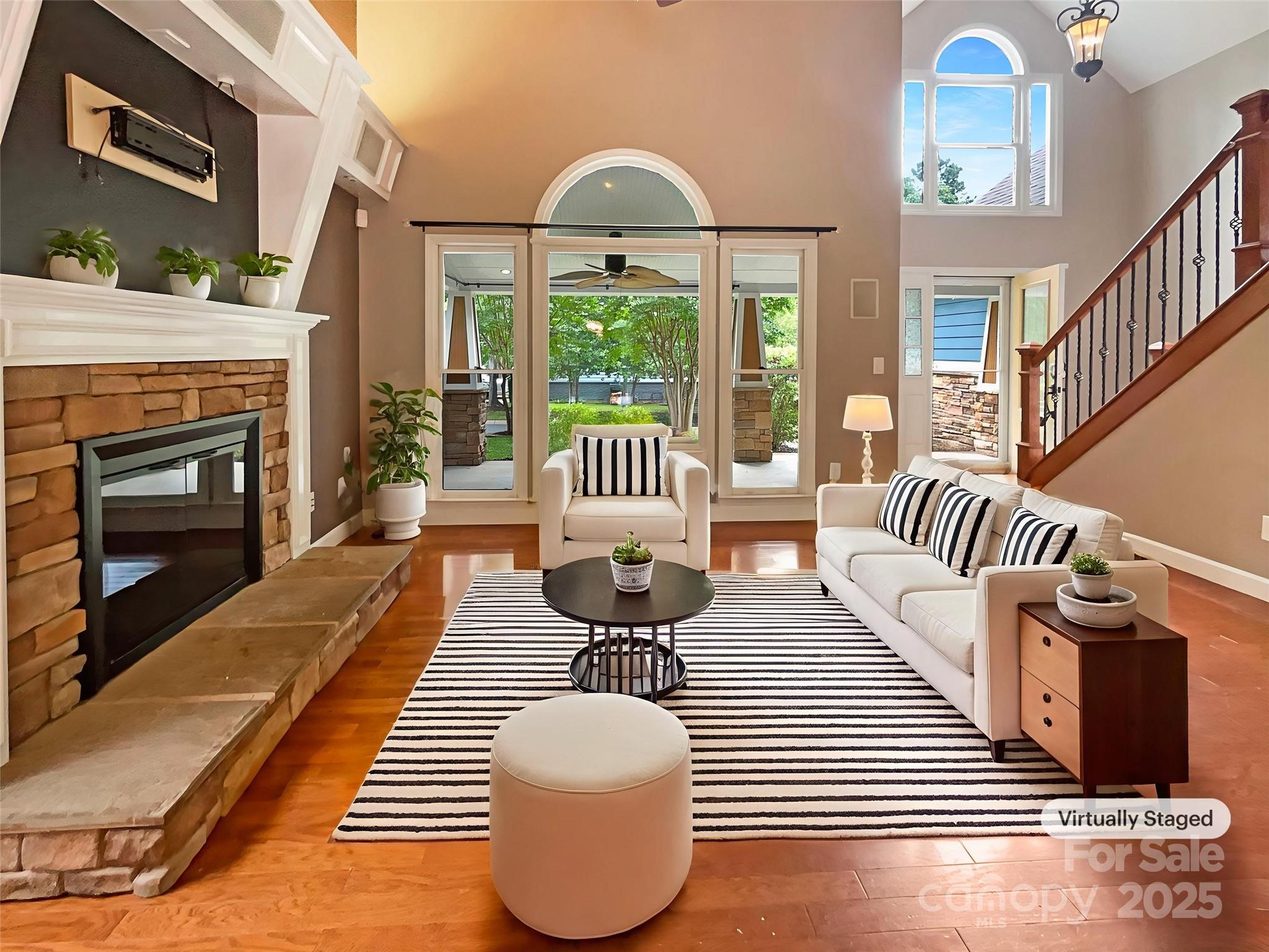 12092 Spinnaker Drive Fort Mill, SC 29708 - Photo 2 of 20 a living room with furniture and a fireplace