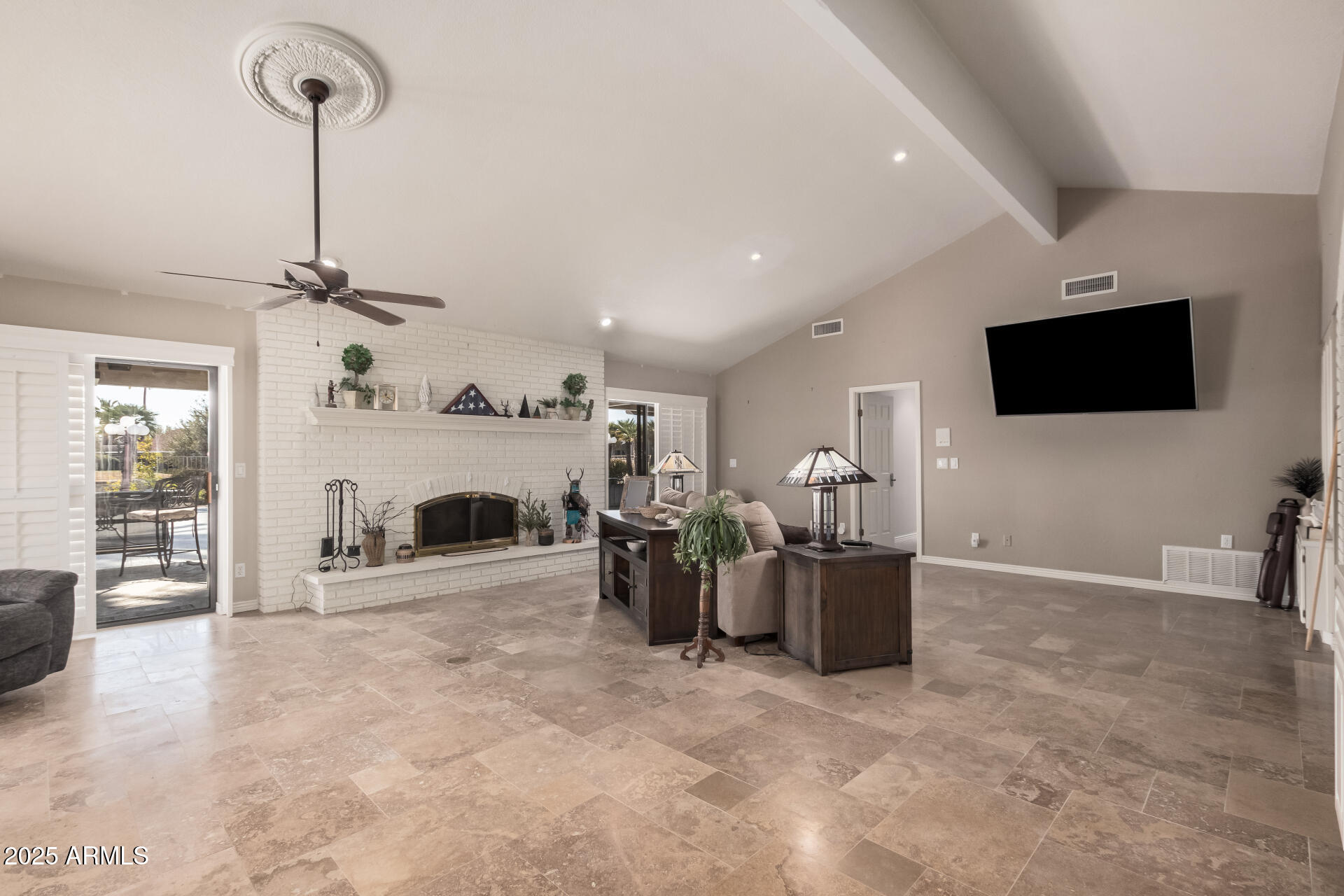 19127 East Wiki Way Rio Verde, AZ 85263 - Photo 9 of 70 a living room with furniture and a flat screen tv