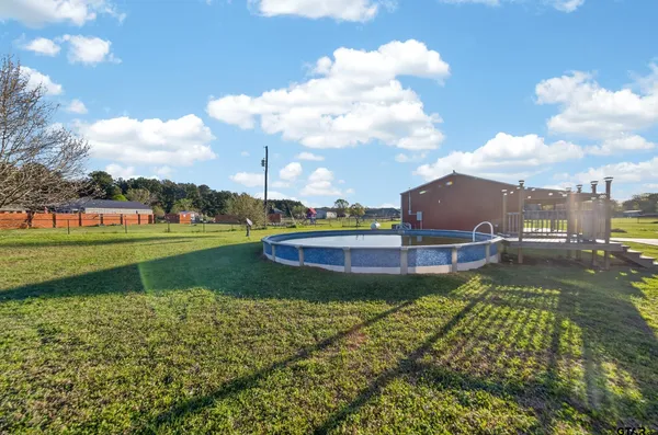 a view of a lake with a big yard