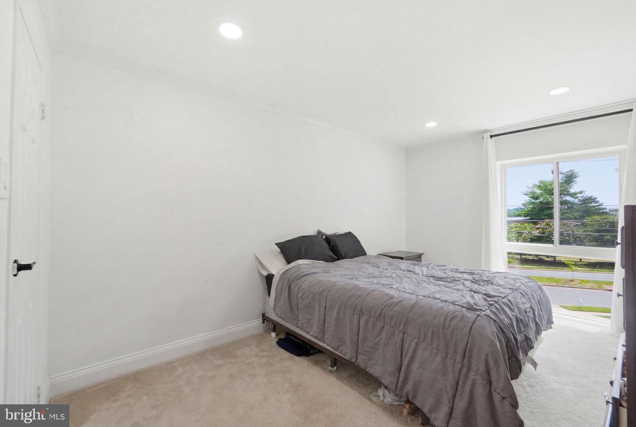 6141 Edsall Road, Unit E Alexandria, VA 22304 - Photo 13 of 16 Bright and airy bedroom retreat.