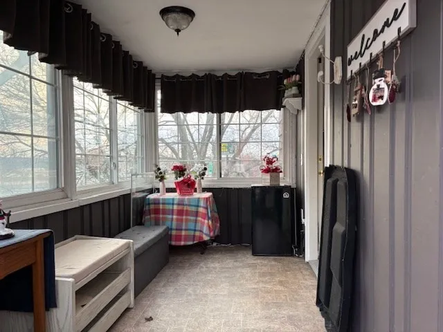 a bedroom with window and walk in closet