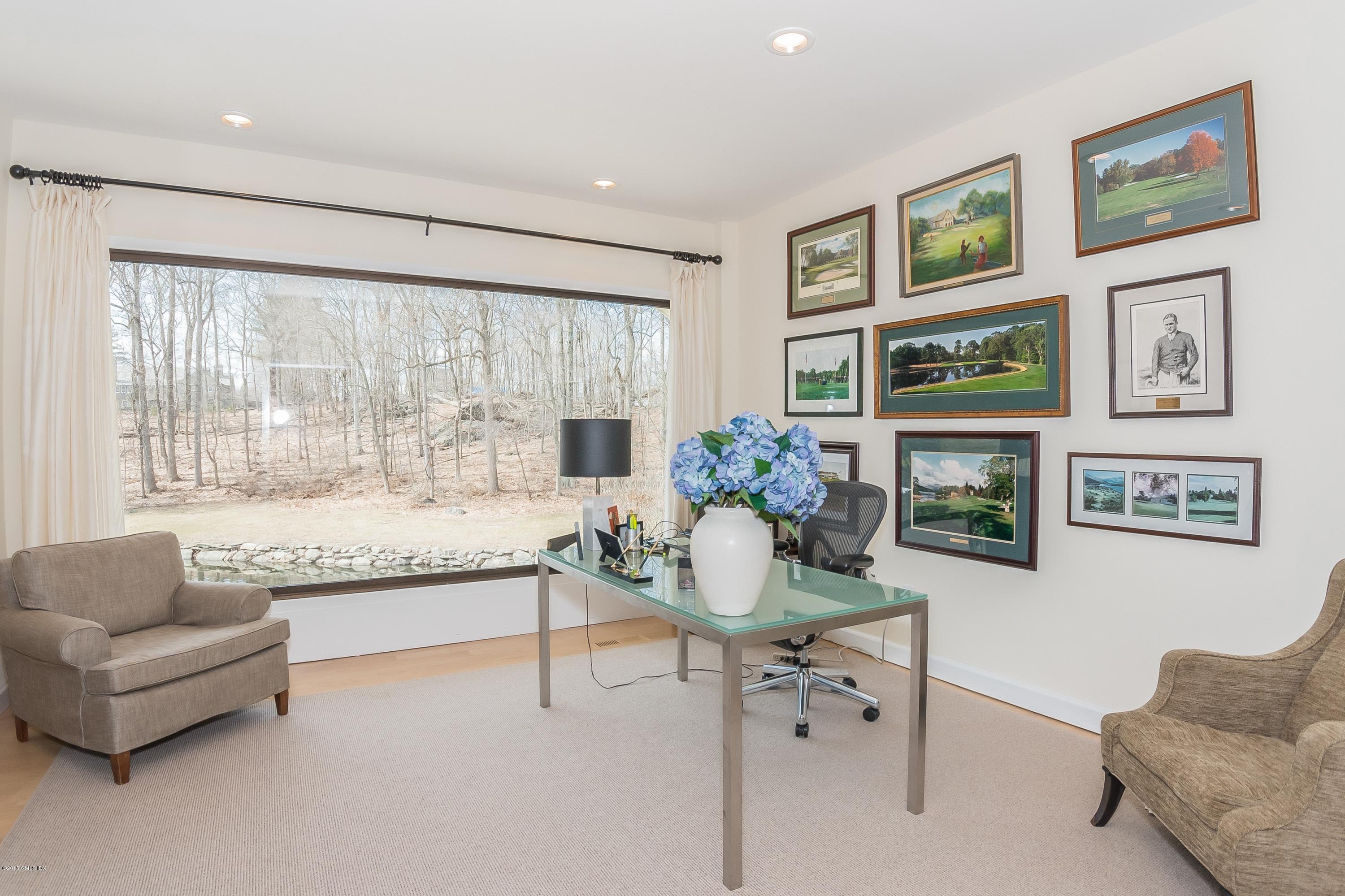 36 Brookridge Drive Greenwich, CT 06830 - Photo 13 of 24 a living room with furniture and a large window