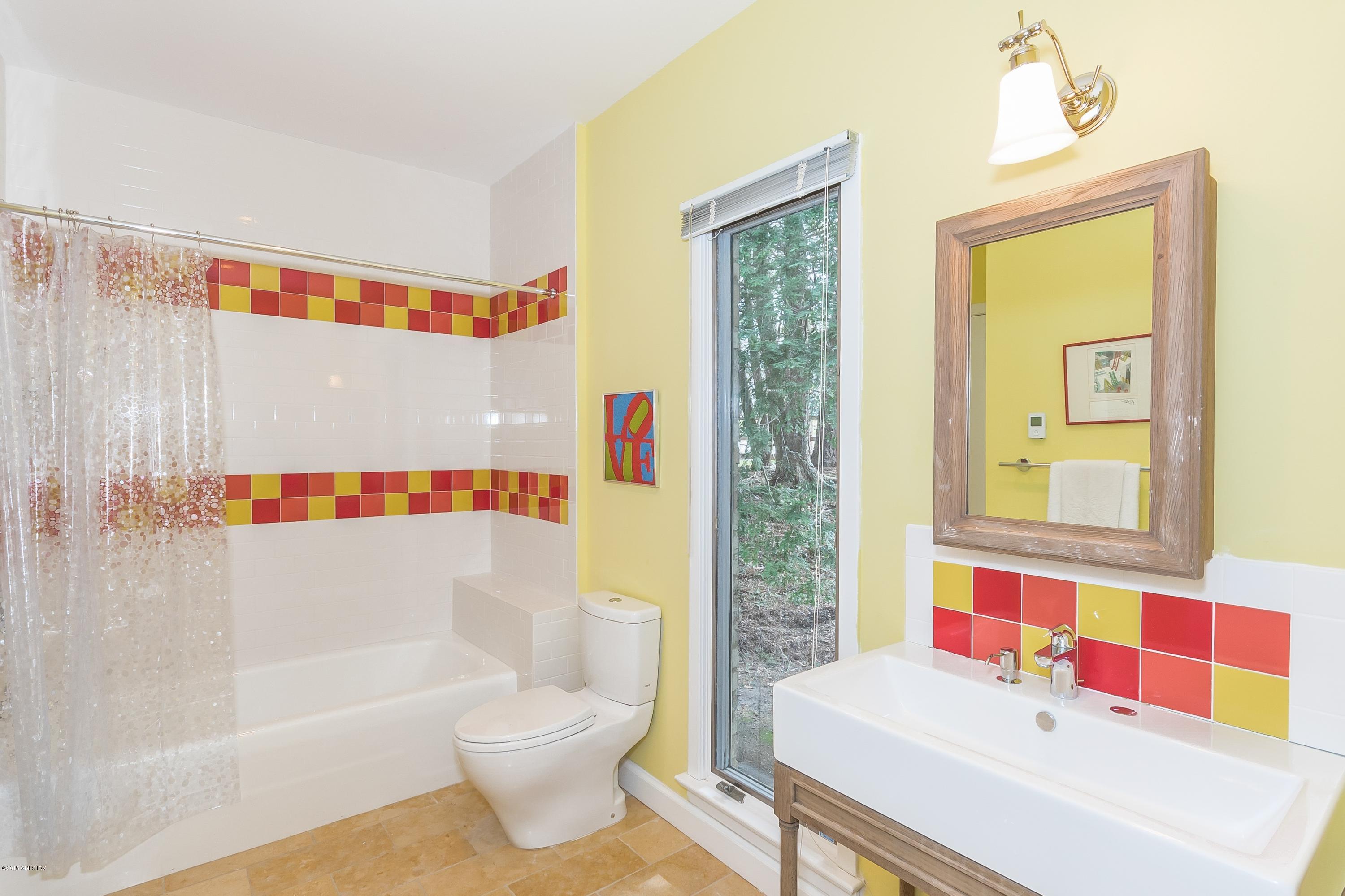 36 Brookridge Drive Greenwich, CT 06830 - Photo 18 of 24 a bathroom with a sink a toilet and a bathtub