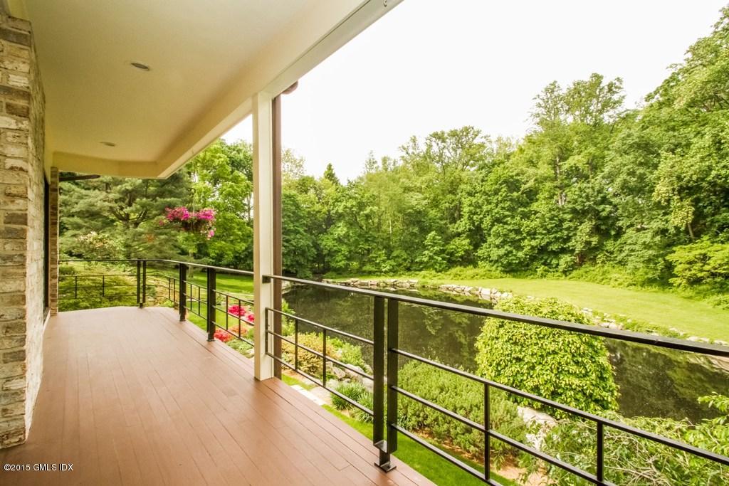36 Brookridge Drive Greenwich, CT 06830 - Photo 23 of 24 a view of a balcony with an ocean view