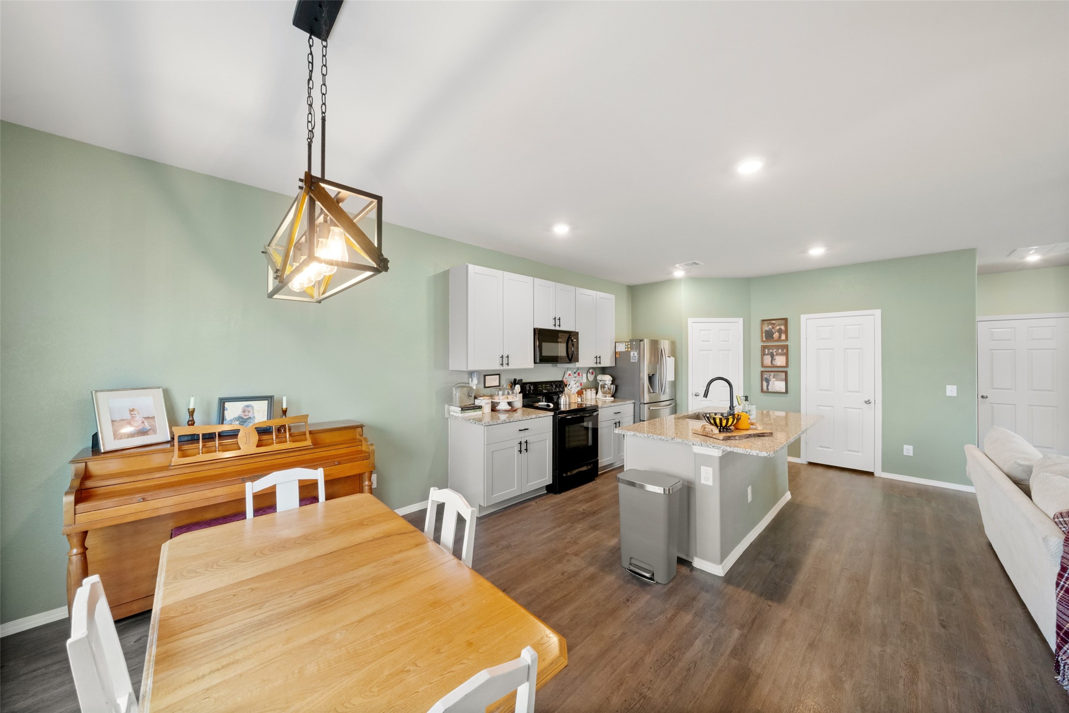 819 Faison Court Montgomery, TX 77316 - Photo 15 of 28 a bedroom with furniture and a wooden floor
