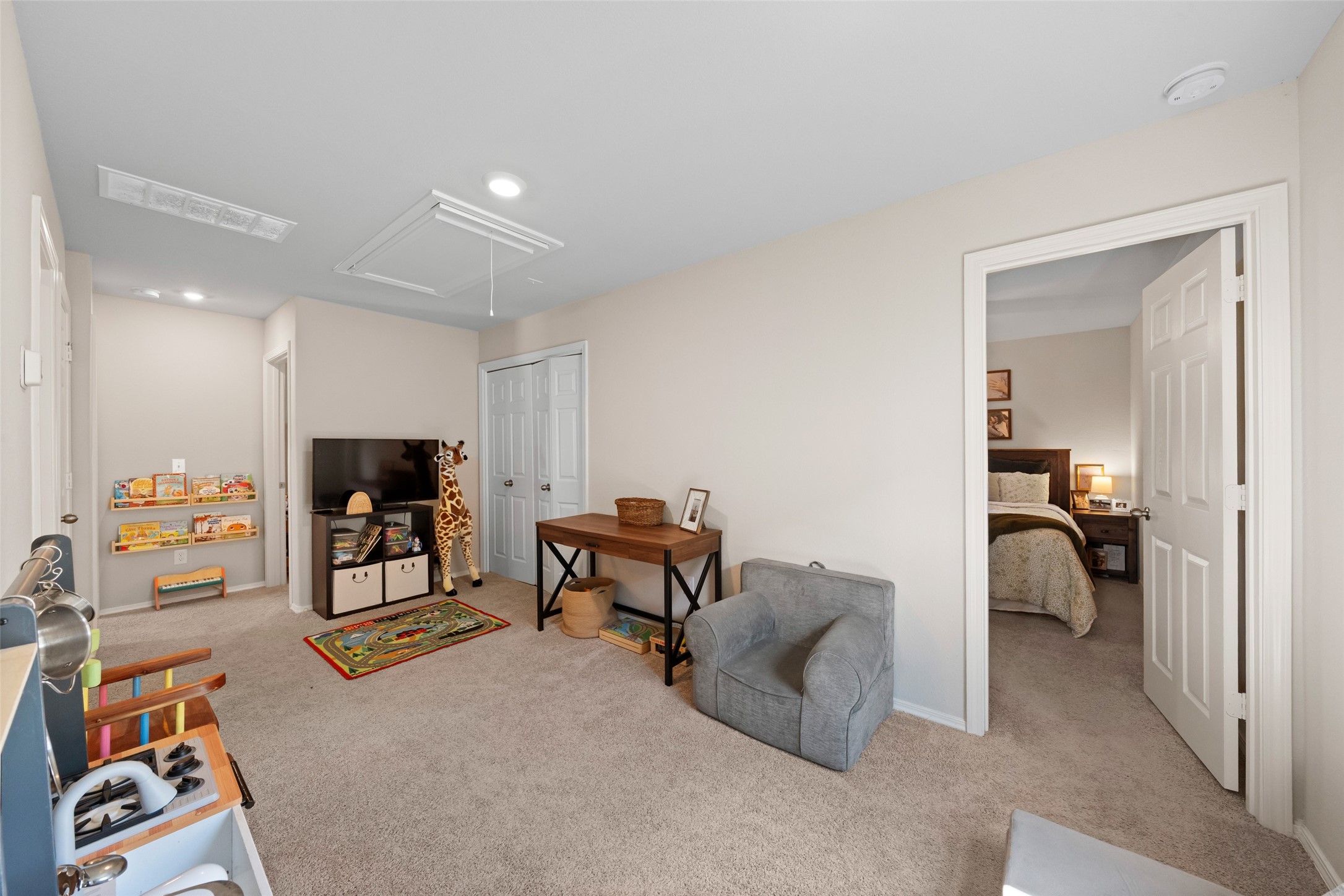 819 Faison Court Montgomery, TX 77316 - Photo 19 of 28 a living room with furniture and a flat screen tv