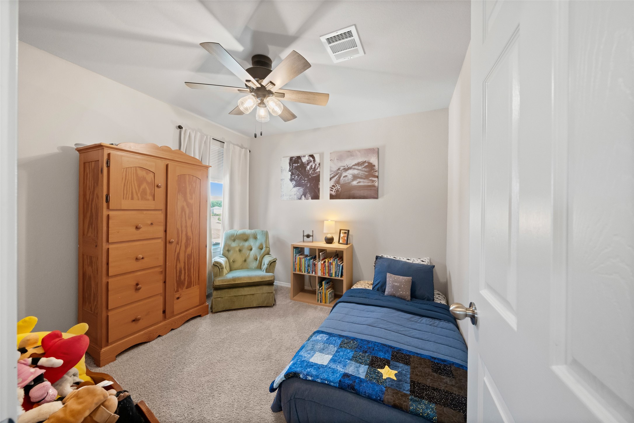 819 Faison Court Montgomery, TX 77316 - Photo 22 of 28 a bedroom with a bed and furniture