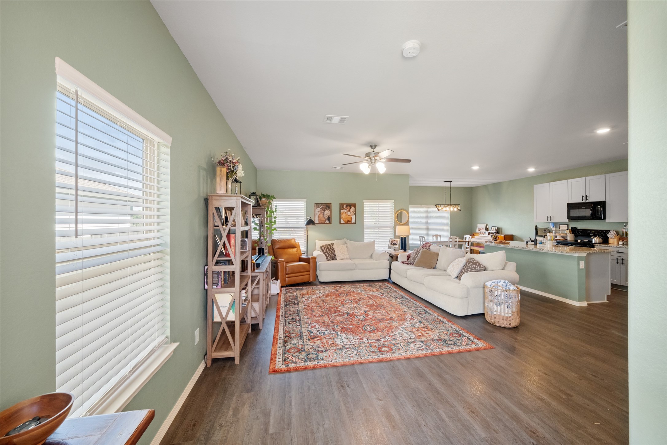 819 Faison Court Montgomery, TX 77316 - Photo 4 of 28 a living room with furniture and a wooden floor
