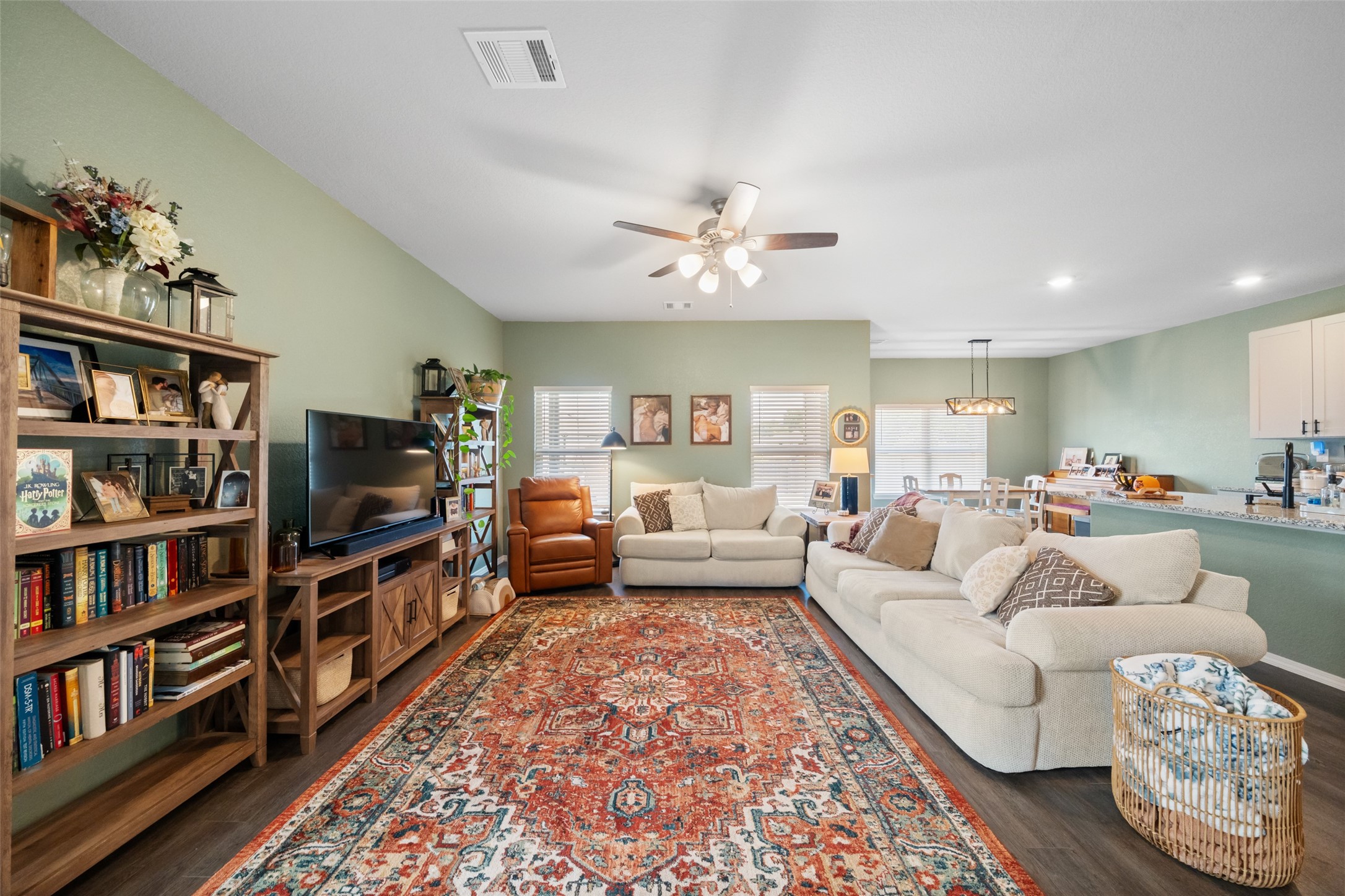 819 Faison Court Montgomery, TX 77316 - Photo 6 of 28 a living room with furniture and a book shelf