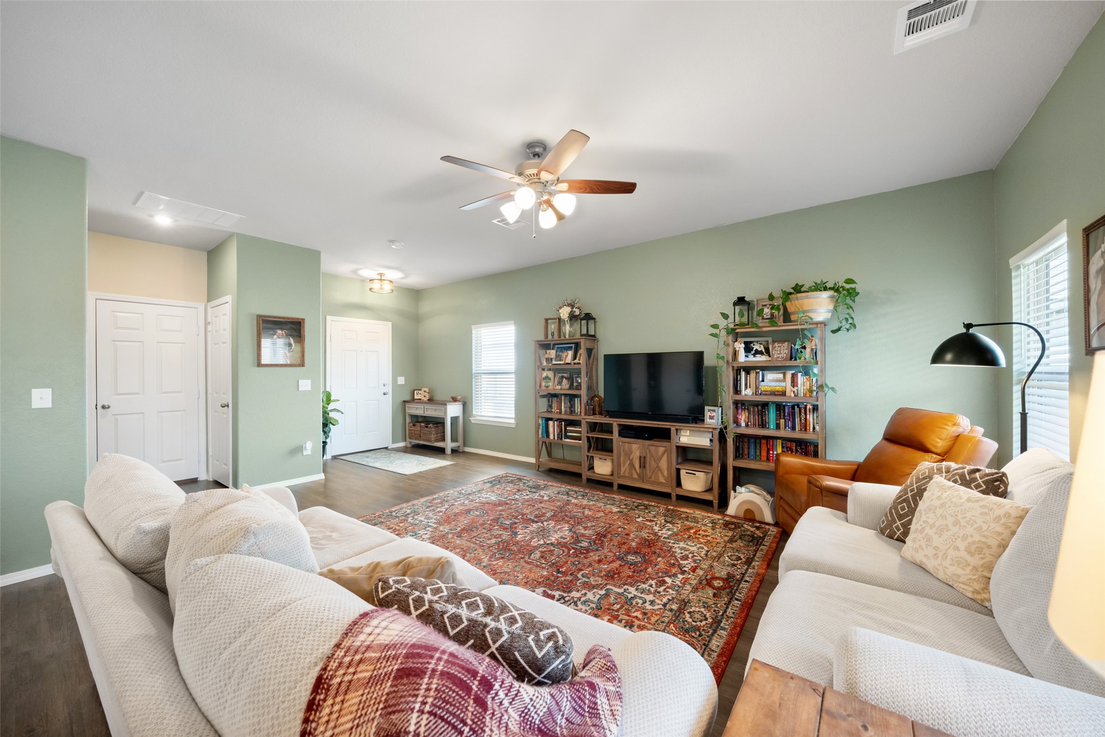 819 Faison Court Montgomery, TX 77316 - Photo 7 of 28 a living room with furniture and a flat screen tv
