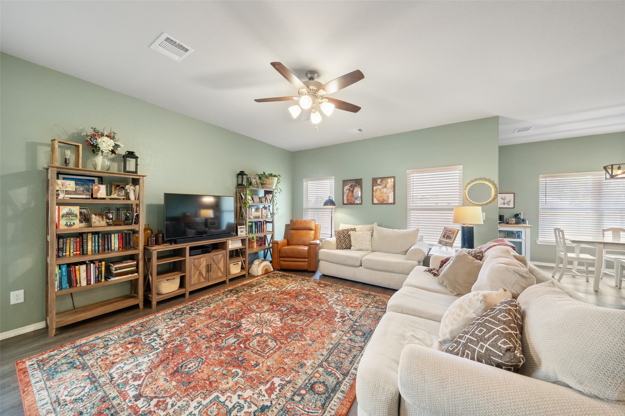 819 Faison Court Montgomery, TX 77316 - Photo 8 of 28 a living room with furniture and a flat screen tv