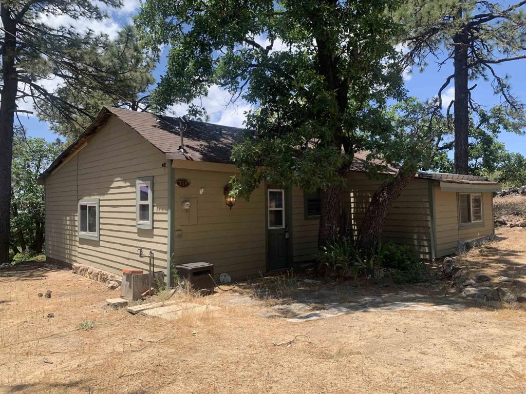 719 Boiling Springs Road Mount Laguna, CA 91948 - Photo 2 of 5 a view of a house with a yard