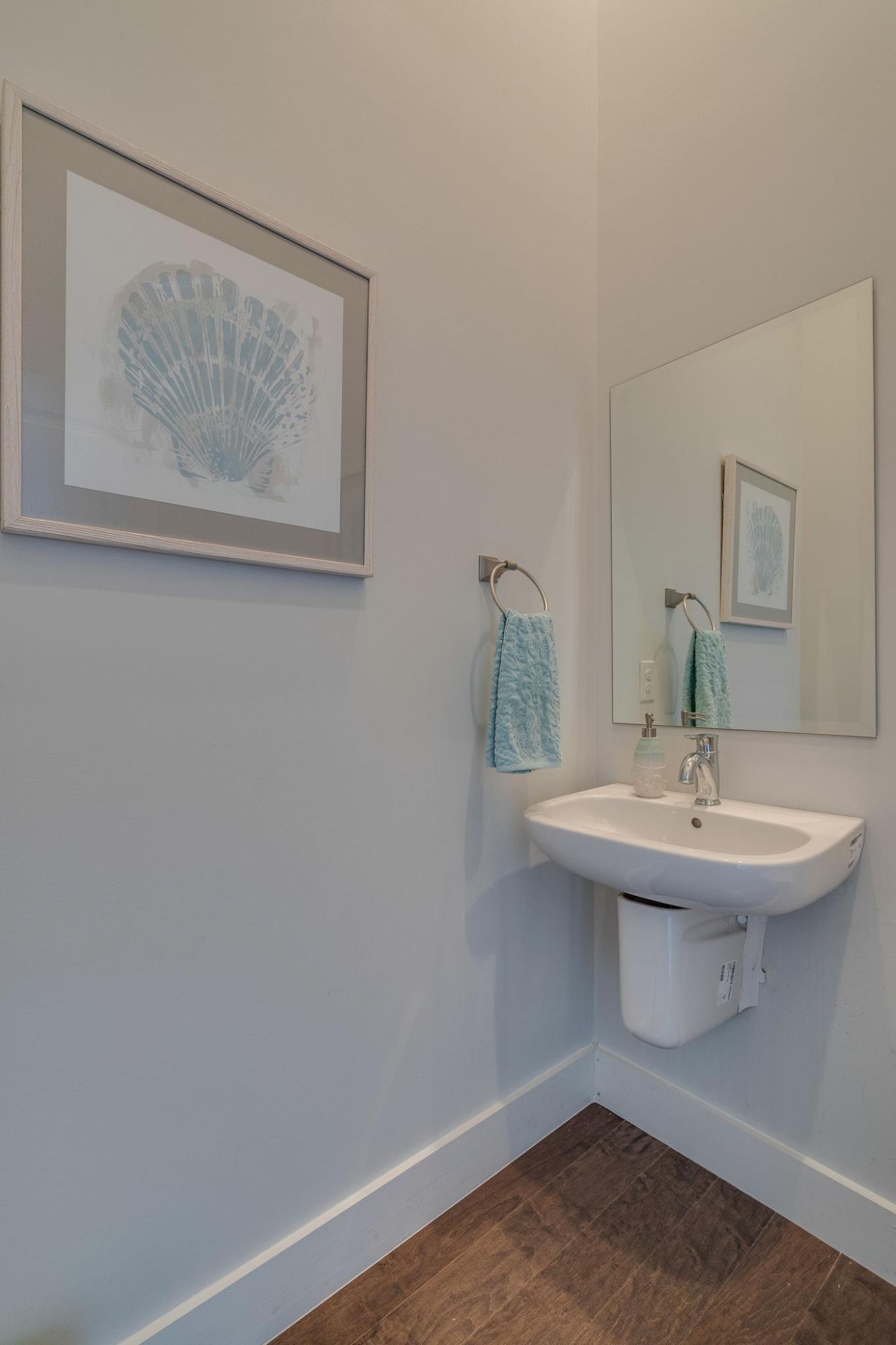 157 Valdare Ln Inlet Beach Inlet Beach, FL 32461 - Photo 17 of 71 a bathroom with a sink and a mirror