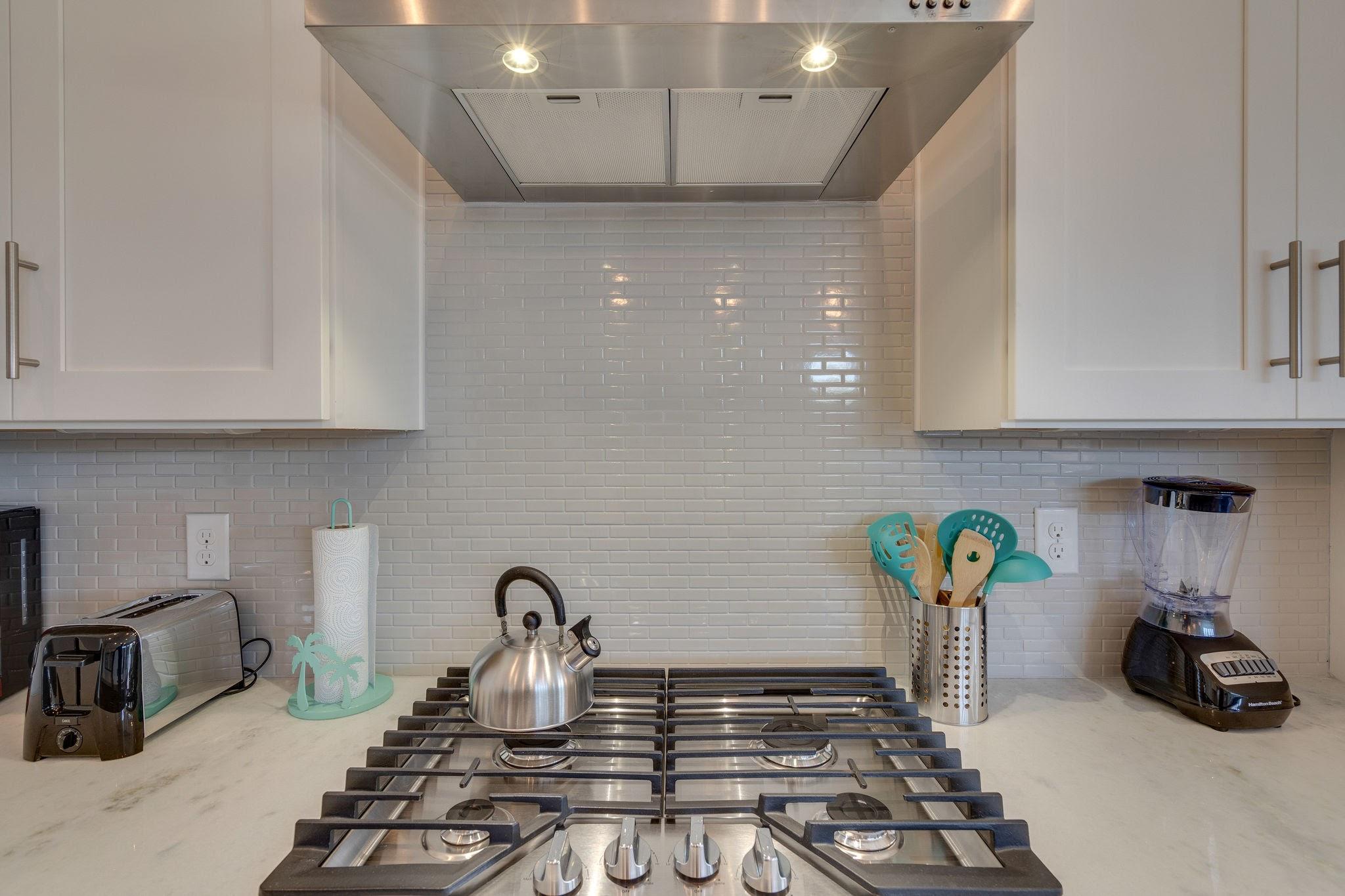 157 Valdare Ln Inlet Beach Inlet Beach, FL 32461 - Photo 28 of 71 a kitchen with sink and cabinets