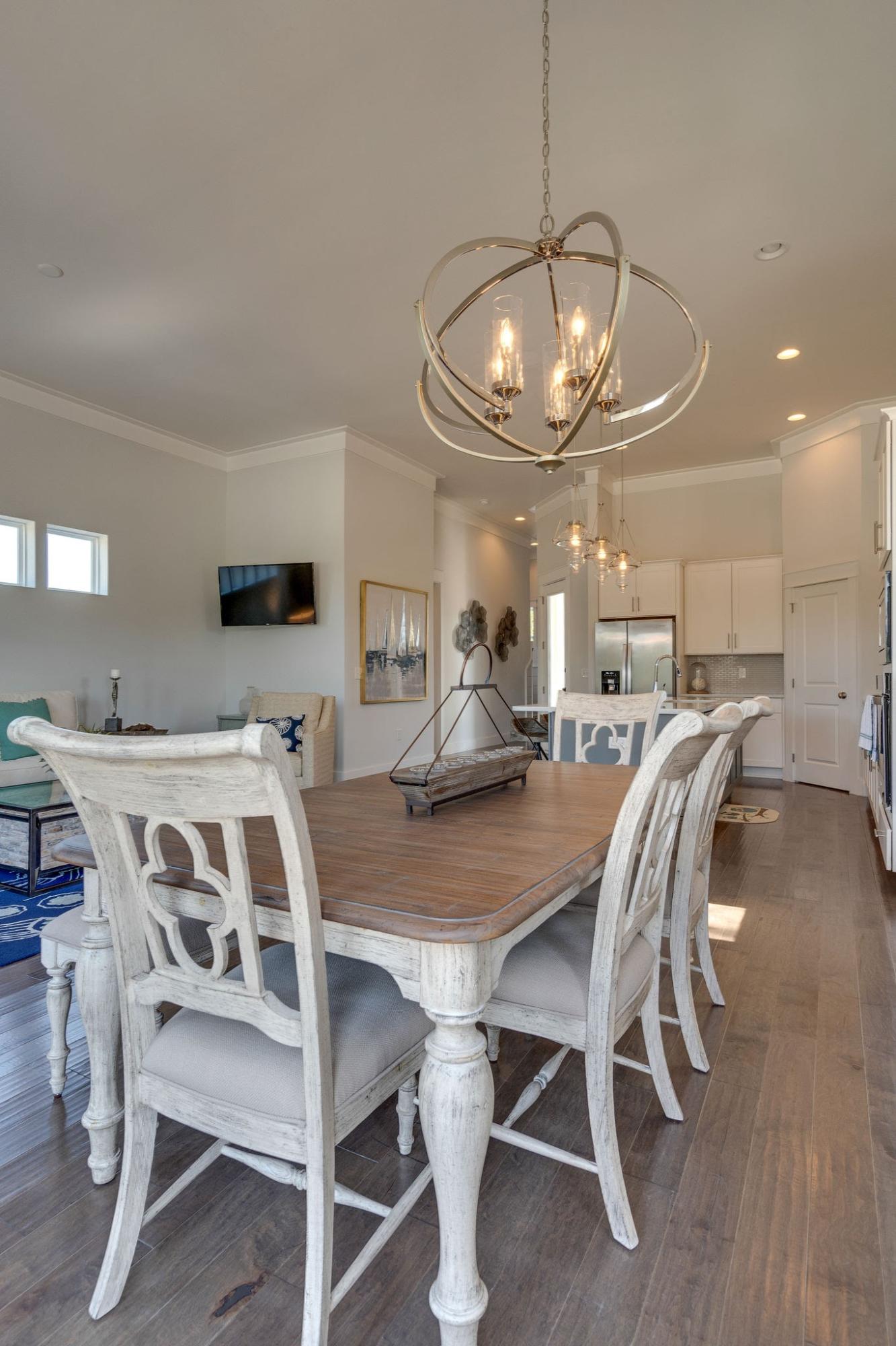 157 Valdare Ln Inlet Beach Inlet Beach, FL 32461 - Photo 33 of 71 a view of a dining room with furniture and chandelier