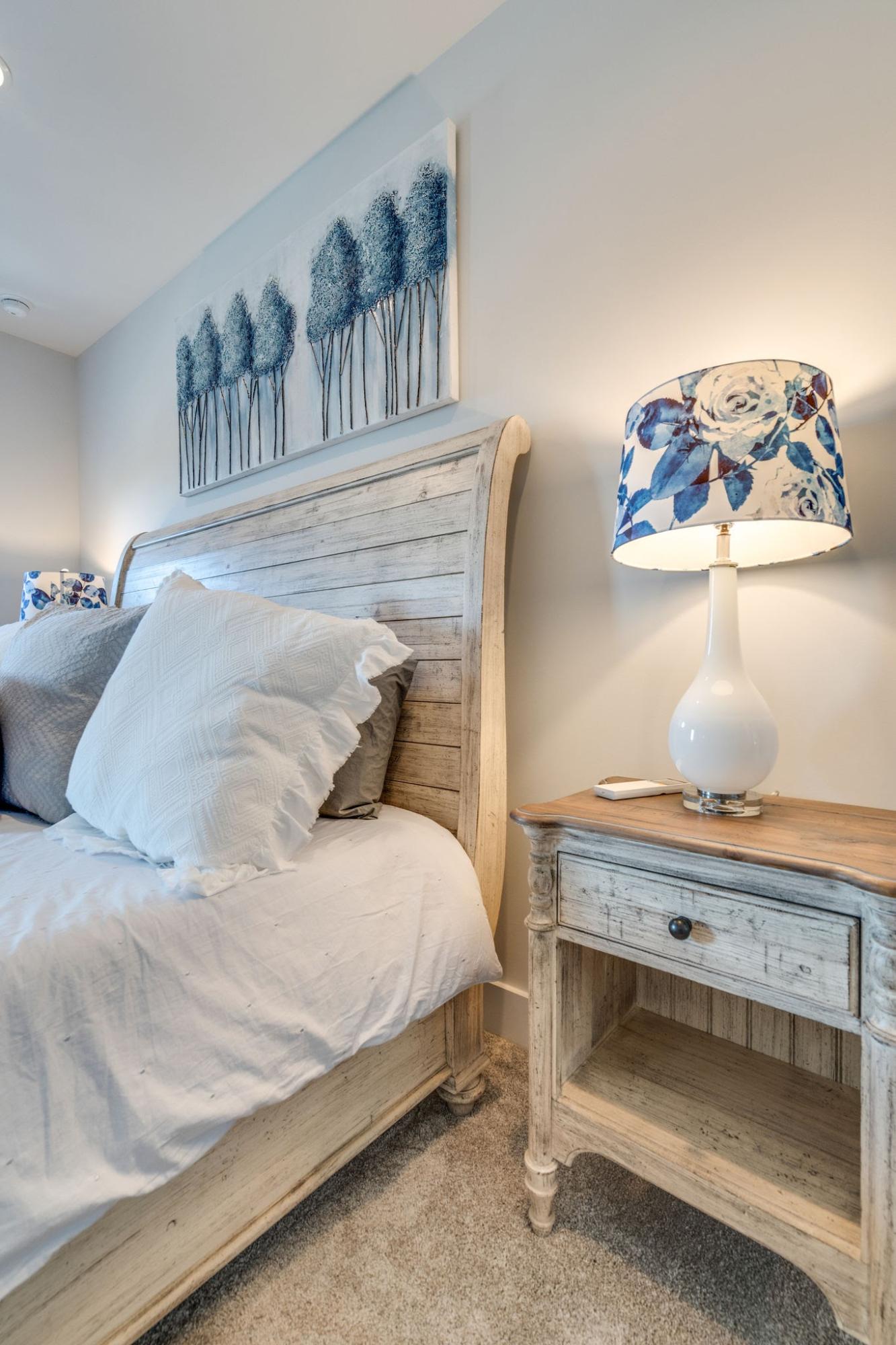 157 Valdare Ln Inlet Beach Inlet Beach, FL 32461 - Photo 53 of 71 a bedroom with a bed and lamp
