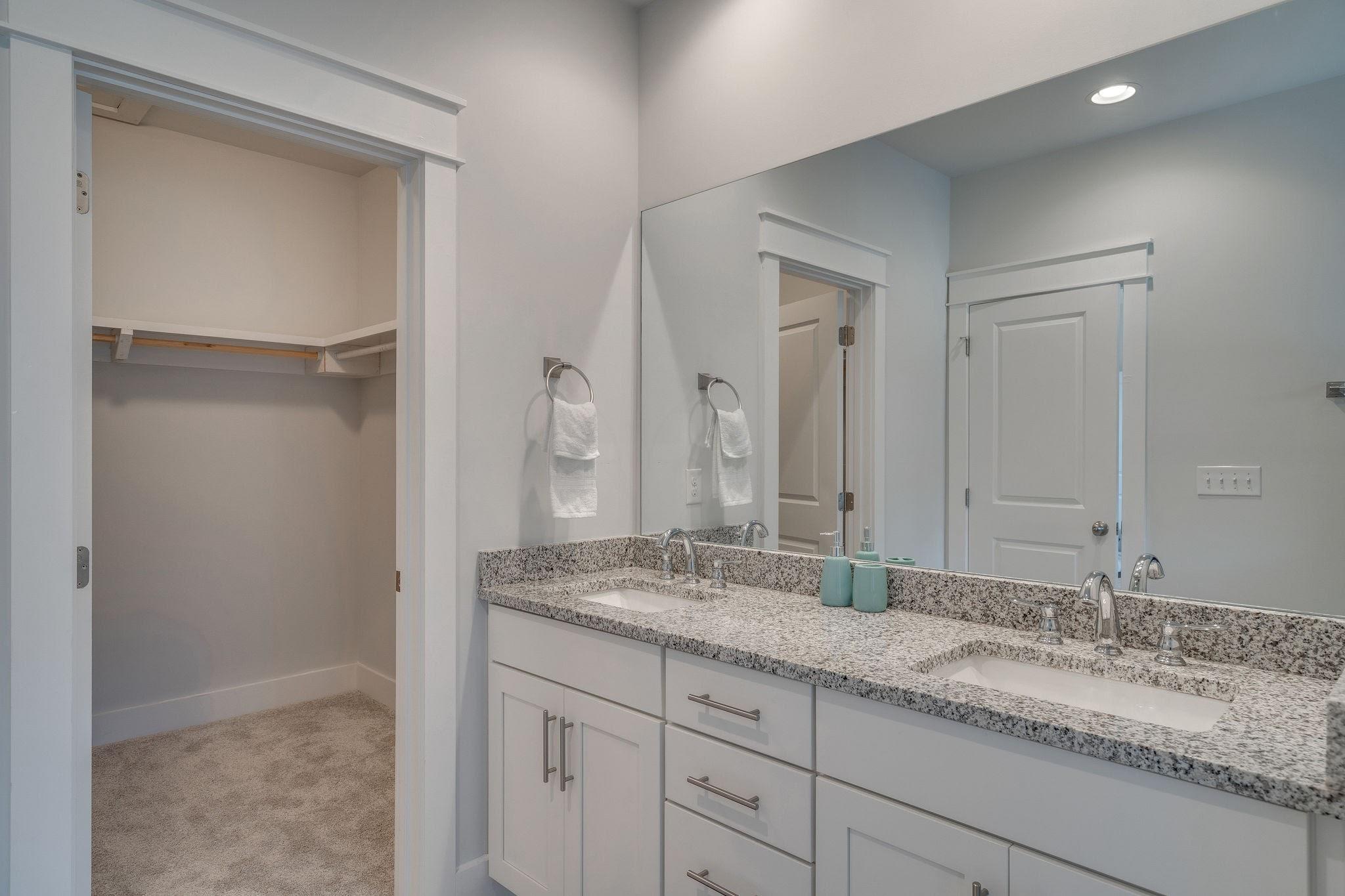 157 Valdare Ln Inlet Beach Inlet Beach, FL 32461 - Photo 56 of 71 a bathroom with a granite countertop sink and a mirror