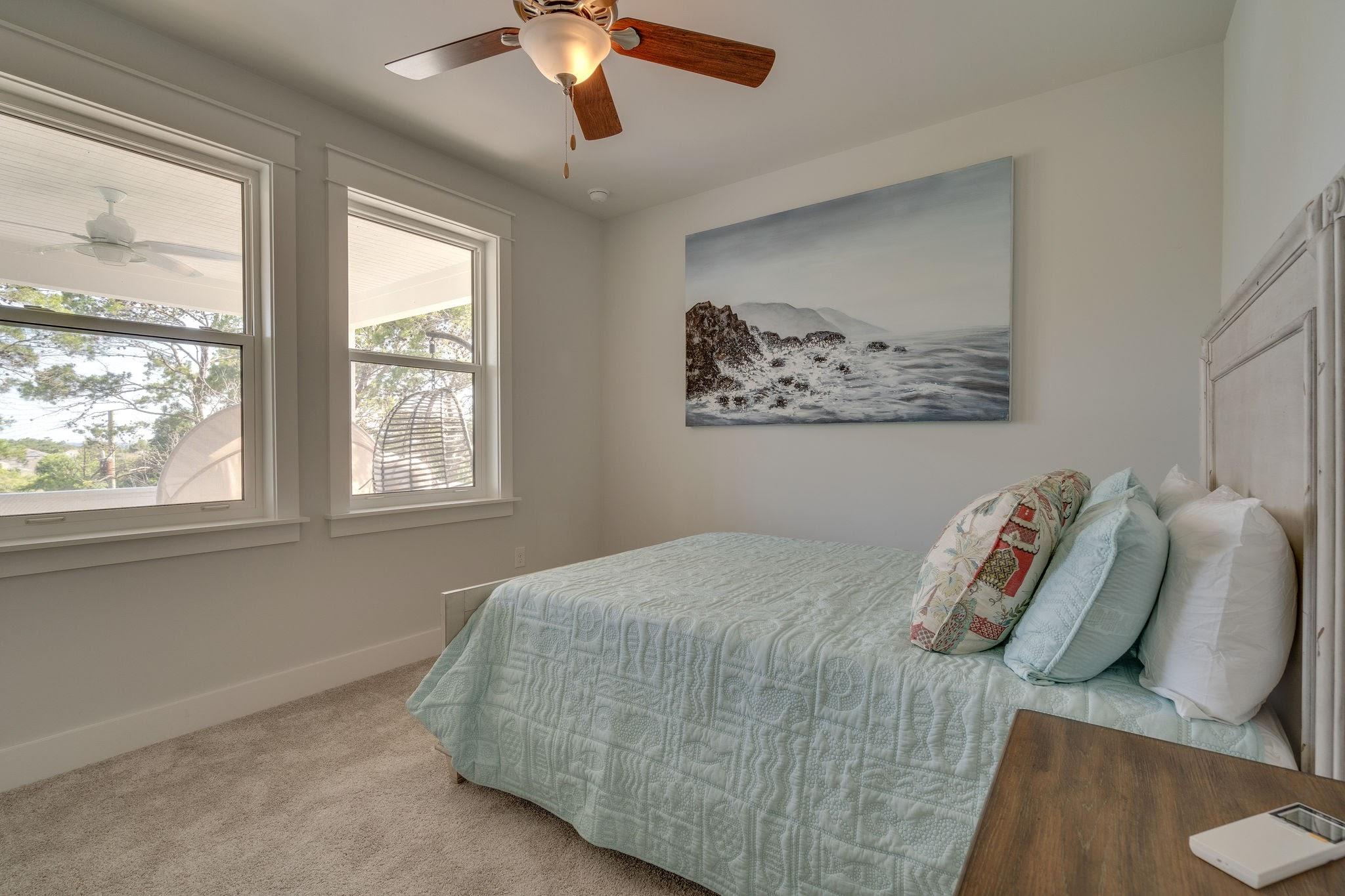 157 Valdare Ln Inlet Beach Inlet Beach, FL 32461 - Photo 59 of 71 a bedroom with a bed and a painting on the wall